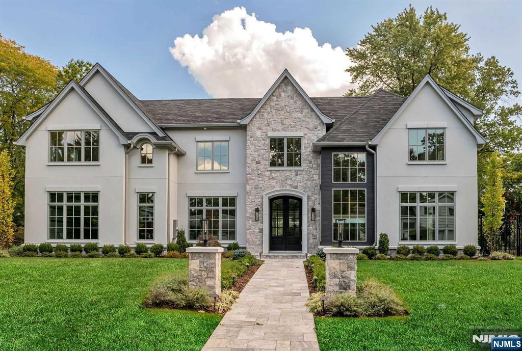 ENGLEWOOD CLIFFS AT ITS BEST!! NEW CONSTRUCTION BUILT BY ENGLEWOOD CLIFF'S PREMIER BUILDER, RUSS PORRINO OF STRATEGIC PROPERTIES. THIS RESIDENCE IS SET ON ONE OF ENGLEWOOD CLIFFS' MOST DESIRABLE STREETS. BUILT TO AN EXTREMELY HIGH STANDARD WITH A CONTEMPORARY FLAIR, OPEN FLOOR PLAN AND 10' HIGH CEILINGS.THE 2 STORY FOYER SETS THE TONE FOR THE FIRST LEVEL WITH A BINOVA KITCHEN IMPORTED FROM ITALY & A GREAT ROOM OVERLOOKING THE POOL, BANQUET DINING ROOM,FORMAL LIVING ROOM,BEDROOM/OFFICE & A FULL BATH PLUS POWDER ROOM.THE 2ND LEVEL FEATURES A LUXURIOUS PRIMARY SUITE W/SITTING AREA, FIREPLACE & FABULOUS BATH PLUS 3 ENSUITE BEDROOMS,LOUNGE AREA & LAUNDRY. THE LOWER LEVEL OFFERS LARGE WINDOWS,HOME THEATER,REC.ROOM,GYM AREA,BEDROOM & BATH.THE REAR YARD IS A TRANQUIL OASIS WITH POOL/SPA,COVERED PATIO & OUTDOOR KITCHEN.THIS HOME HAS CUSTOM LANDSCAPE LIGHTING, HIGH EFFICIENCY HEATING & FOAM INSULATION. COMPLETE WITH ALL AMENITIES INCLUDE IRON FENCING, GAS GENERATOR AND ELEVATOR READY.