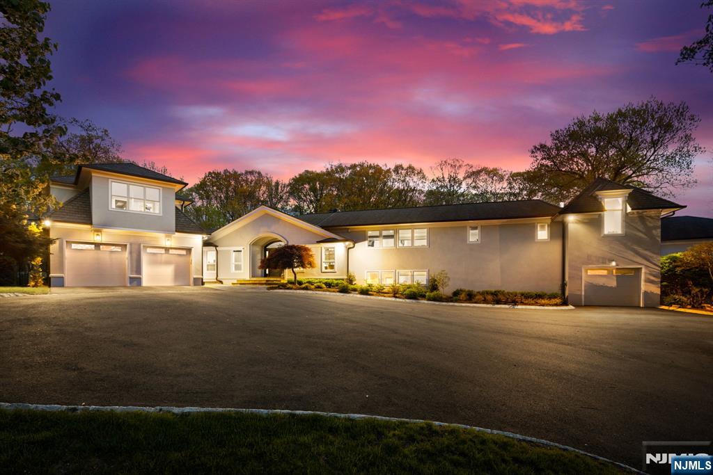 Set on 1.5 private gated acres, 425 Highview Road is a fully rebuilt 11,000+ sq ft modern luxury home completed in 2024. The first floor offers a private office with cigar-grade ventilation, formal living and dining rooms, a great room with three doors to the outdoors, and an eat-in chefâ€™s kitchen plus a separate prep kitchen. A new mudroom and pristine three-car garage enhance functionality. The second level includes five bedrooms and four baths, including a stunning primary suite with dual walk-in closets and a spa bath with two water closets, plus a bright gym/rec room. The finished basement adds a den, wine cellar, bedroom with bath, large laundry room, and an indoor pickleball court. Outdoor amenities include a sport court, 6-ft fencing, an 18-ft driveway, and plans for a pool and outdoor kitchen. A rare East Hill custom home offering exceptional craftsmanship and lifestyle.