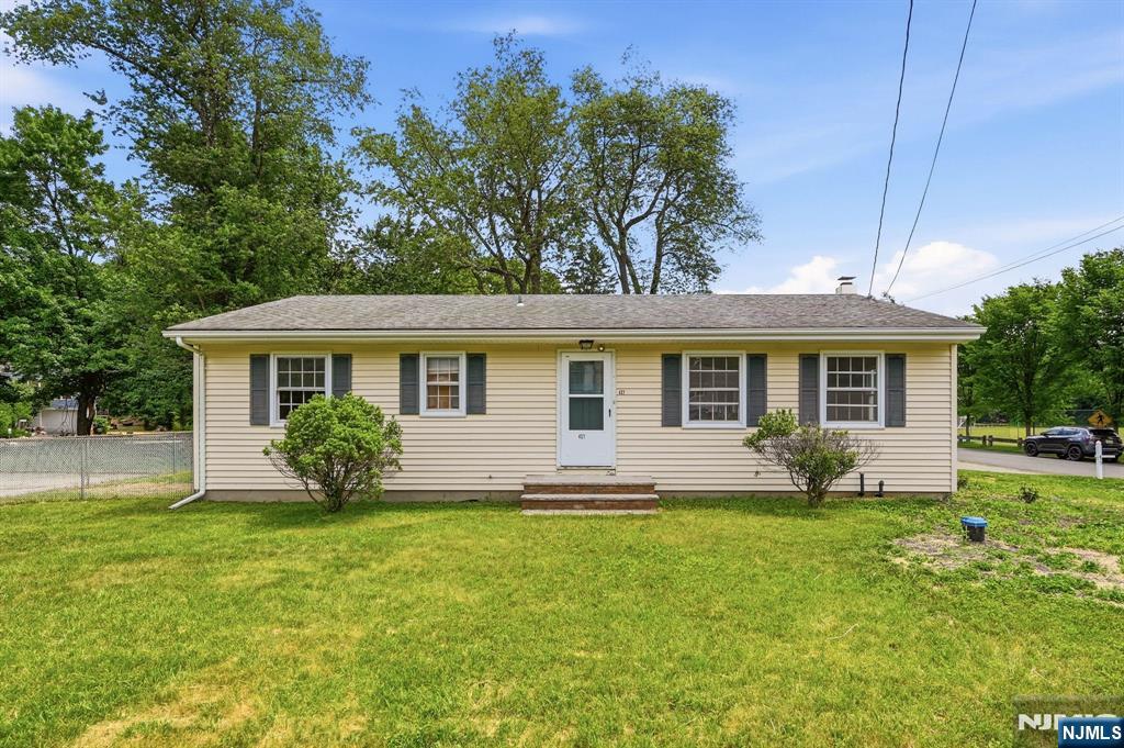 Opportunity Awaits in Upper Greenwood Lake! This 3 bedroom, 1.5 bath ranch sits on a level corner lot next to the recreation field and offers easy one floor living with an attached 2-car garage. Featuring hardwood floors, a spacious living room, dining area off Kitchen and plenty of natural light, this home is ready for your updates and personal touch. New Oil Tank, Well Pump and Expansion Tank in 2026. Conveniently located on Warwick Turnpike with quick access to Warwick, NY's orchards, wineries, dining, shopping, and more. Bring your imagination and transform this home into your dream retreat! Schedule a Showing Today!