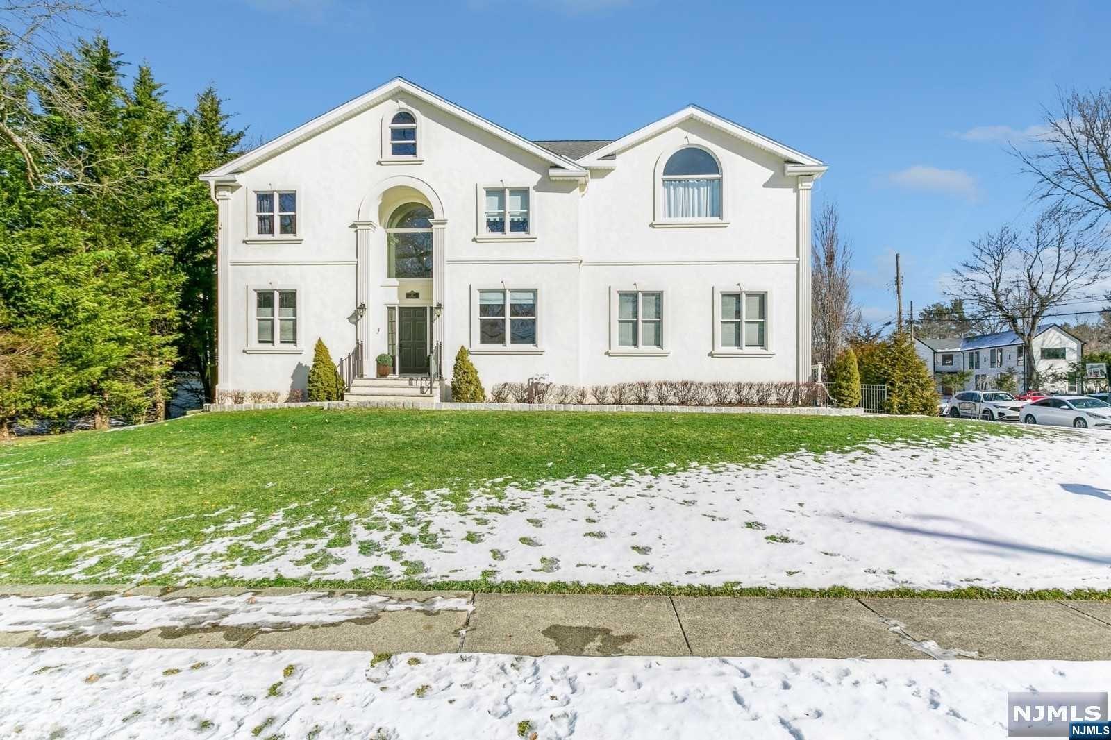 Presenting a stunningly renovated gem in Closter, NJ, this home is the epitome of modern elegance combined with comfort. Built in 2000, it's like new with extensive renovations including a sleek kitchen, luxurious bathrooms, new siding, and new hardwood floors. The main floor boasts an inviting entry foyer, spacious formal living and dining rooms, a family room with fireplace, a well-appointed kitchen, guest suite, powder room and laundry, alongside the two car garage. The second floor features large primary suite with walk-in-closet, junior suite, and two additional bedrooms sharing full bath. The fully finished basement is a highlight, offering a high ceiling, a gym, a recreation area, and extra storage space. Outside, the private backyard is a serene retreat. Located at one of Closter's most picturesque streets, and near a renowned blue-ribbon school, this home is a perfect blend of luxury and comfort.