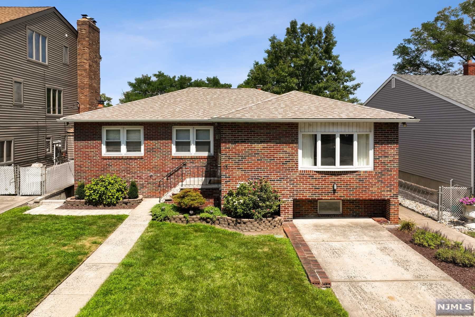When a prime location and immaculate interior top your list, look no further than this beautiful 3 Bedroom, 2 Bathroom ranch located in the desirable north end section of Secaucus, across the street from Schmidts Woods Park and within walking distance to nearby recreation center, town pool, and NYC train & bus. This is a perfect home to entertain as the large living room flows into the formal dining room. The new and modernly updated eat-in kitchen features stainless steel appliances, a center island with granite counters & skylight. The spacious family room w/sliding door leads to the deck overlooking the tranquil property & untouched. Truly a private and serene setting, ideal for outdoor entertaining. On the main floor you'll find the primary suite, two additional bedrooms and a full bathroom. This is the perfect extended-family style home as the finished walkout basement includes another bedroom with walk-in closet, living room, kitchen, and full bath with private entrance.