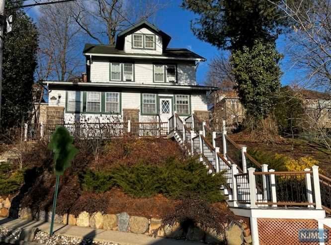 If your a buyer who mostly relies on public transportation, this is the home for you! Nestled in the hills of Edgewater Ave just a short walk to bus stop, center of town, parks, pool, tennis courts and convenience store. This three bedroom colonial features: entrance foyer, large living room drenched with natural sunlight, formal dining room, modern eat-in-kitchen and laundry. Second floor: three bedrooms and full bath with shower over tub. Full walk up large finished attic with high ceilings. Perfect for home office and extended family space. Enjoy the nice days from the secluded yard overlooking the valley below. Note: This home does not have off street parking. Parking on Englehart Terrace.
