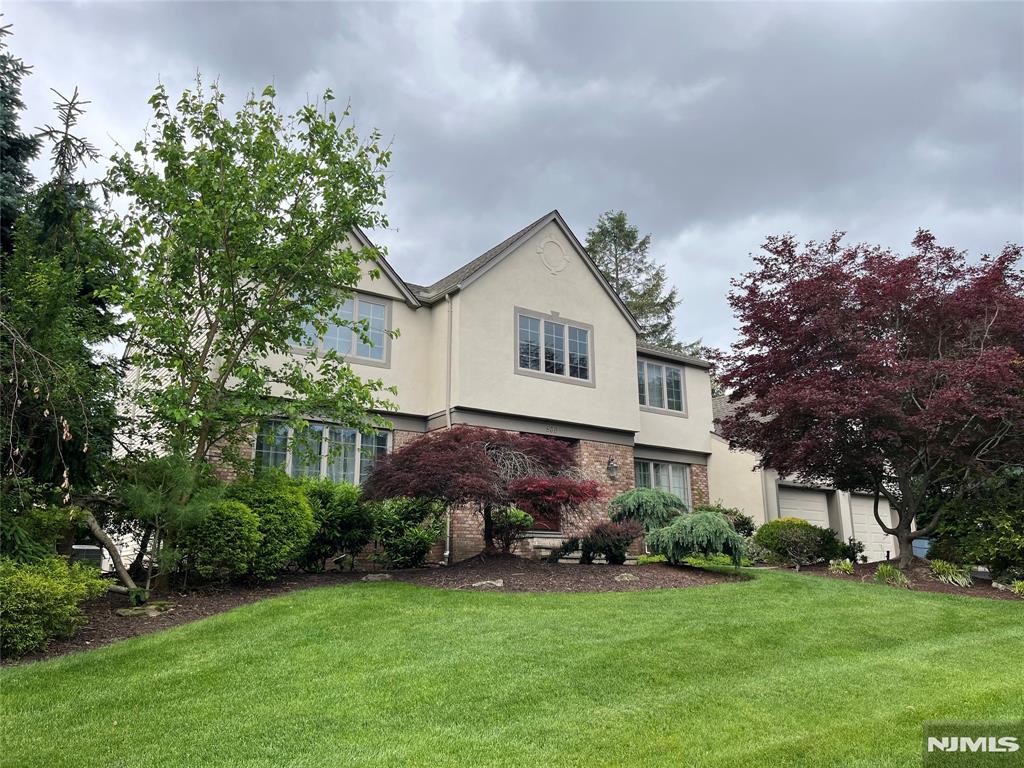 Spacious 5-bedroom Colonial located in a highly sought-after neighborhood with a top-rated school district. This impressive home welcomes you with a grand marble foyer and elegant staircase. The expansive family room features a beautiful marble fireplace, creating a warm and inviting gathering space. The kitchen opens directly to a large deck, ideal for entertaining and outdoor dining. The fully finished basement provides exceptional additional living space, including a family room, office areas, a bonus room with closets, and ample storage. Outside, enjoy a beautifully landscaped yard that offers both charm and privacy. A wonderful opportunity to own a spacious home in a prime location. Property is being SOLD strictly in AS-IS condition.