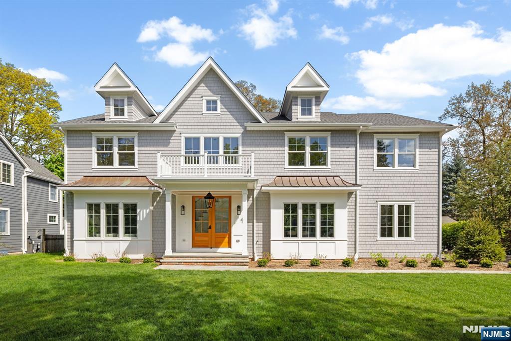 Discover a rare opportunity to own brand-new, bespoke luxury construction in the highly coveted town of Ridgewood, set on a quiet, tree-lined street in an idyllic neighborhood. Perfectly situated on a large, private, level property, this exceptional residence is masterfully designed by the renowned MIF Design and offers over 5,500 sq. ft. of refined living space. A thoughtfully curated open-concept layout showcases a custom chefâ€™s kitchen with premium Thermador appliances, an expansive statement island, coffee bar station, and sunlit breakfast area flowing seamlessly into a grand family room with fireplace with French doors to a beautiful patio. The main level also features elegant formal living and dining rooms, a versatile office/playroom, powder room, custom pantry & mudroom, and a dramatic foyer with designer finishes. Upstairs, the luxurious primary suite offers dual walk-in closets and a spa-inspired bath with freestanding tub and glass-enclosed shower. Three additional bedrooms, one junior suite bedroom and a well-appointed laundry room complete the second level. The finished lower level with 9-ft ceilings includes flexibility for a huge recreation lounge, a potential gym or office, full bath, a bedroom/bonus space & storage. A deep backyard with pool potential, oversized driveway, and two-car garage complete this exceptional home just moments from top-rated schools and vibrant downtown.