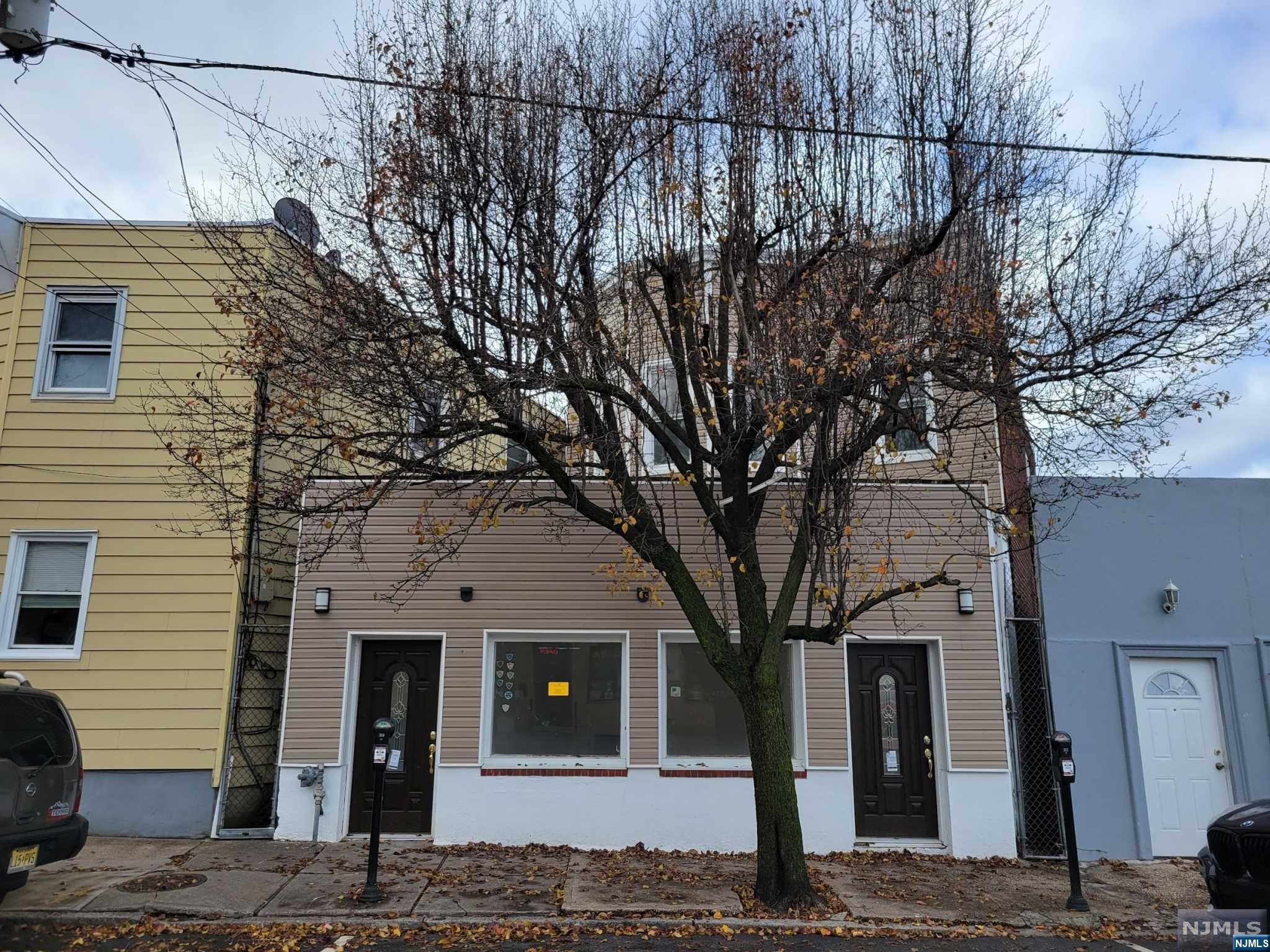 Completely renovated 2 family home w/ additional storefront space perfect for owner occupancy or investment!! Everything is new from electric to plumbing, beautiful new kitchens & bathrooms with top quality materials. Also features a full basement with separate utilities. Located with short walking distance to the Tonelle Lightrail. Call listing agent today!!!
