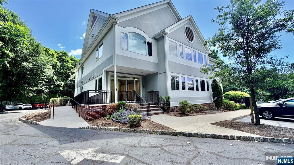 Newly renovated professional office suite with scenic views offering 1,553 SF on the second floor of a well-maintained elevator building. This light-filled suite is surrounded by windows, creating a bright and welcoming workspace. Zoned for both medical and general professional office use, the layout features four private offices, including three large offices and one smaller private office, a large waiting/reception area, a kitchenette with sink, and a coat/storage closet. Men's and women's restrooms are conveniently located in the hallway. Ample on-site parking is available. Furniture may be available for purchase. This is a lease assignment opportunity with approximately 30 months remaining on the current term, plus a 5-year renewal option. The lease escalates 3% annually beginning January 1, 2027.