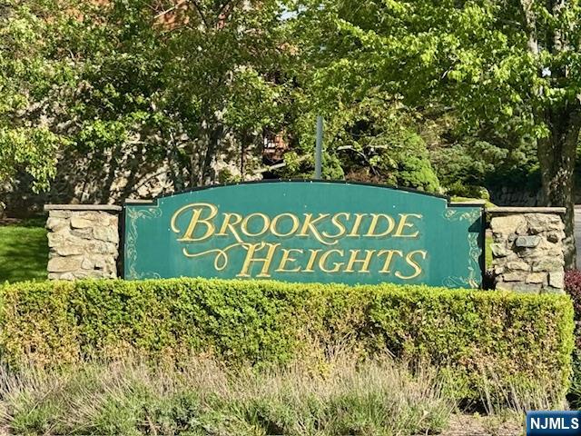 Welcome to Brookside Heights, one of Wanaque's most desirable communities, where comfort, style, and picturesque surroundings come together seamlessly. This beautifully updated 2-bedroom, 2.5-bath townhome is filled with natural light and offers spacious, inviting living with scenic views from every level. Step inside to an open-concept floor plan designed for today's lifestyle, featuring an updated kitchen, beautifully renovated bathrooms, and expansive living and dining areas that are perfect for both everyday living and effortless entertaining. Upstairs, you'll find generously sized bedrooms with abundant closet space, including a tranquil primary suite that provides the perfect retreat at the end of the day. The finished lower level adds exceptional versatility, offering the ideal space for a home office, fitness area, media room, playroom, or guest suite. Multiple private decks extend your living space outdoors, providing peaceful settings to enjoy your morning coffee, unwind with evening sunsets, or simply take in the surrounding natural beauty. Ideally located near shopping, dining, parks, and major commuting routes, this move-in-ready home offers the perfect balance of convenience and tranquility. Don't miss this rare market opportunity to own a truly exceptional home in sought-after Brookside Heights!