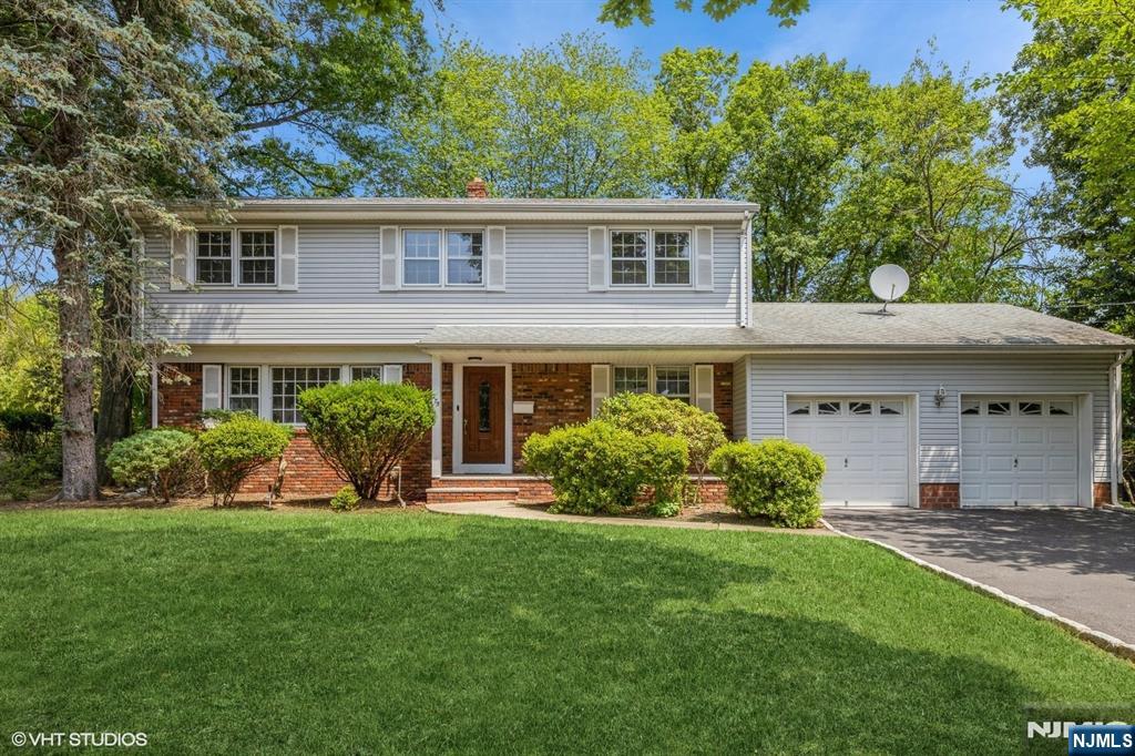READY TO MOVE IN ! ALL THE WORK IS DONE FOR YOU ! Renovated Home in Prime Paramus Location ! Beautifully updated throughout, this spacious 9-room home offers 4 bedrooms and 2.5 baths, including a master suite with a full bath and walk-in closet. Features include solid oak hardwood floors, granite countertops, and ceramic tile in the kitchen, bathrooms, and finished basement. Brand new stainless steel gas stoveâ€”dishwasher, microwave, washer, and dryer. Enjoy Brand new central air system, a central alarm system, and use of the yard. Walking distance to houses of worship and NYC transportation. Built in 1960's. Owner holds NJ/NY Real Estate Licenses.