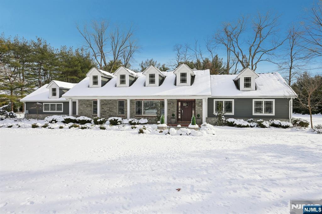 Fabulous Urban Farms Mill Gate location set on 1.2 acres. This approximately 3,200 sq ft home was fully gutted, renovated, and expanded in 2010. Features include 10-foot ceilings in the entry foyer, living room, dining room, and family room. The primary suite offers a 13-foot tray ceiling, a spacious primary bath, and a walk-in closet. The kitchen and all bathrooms are appointed with high-end appliances and premium fixtures. Designed for one-floor living with garage access and laundry conveniently located on the main level. Additional highlights include a 748 sq ft covered patio, a 203 sq ft covered porch, a whole-house generator, and professionally designed outdoor living spaces. The property has been thoughtfully upgraded with a covered patio, a new septic system installed in 2017, extensive landscaping with mature privacy trees, bluestone walkways at the front and rear of the home, and substantial interior improvements including updated trim, doors, bathrooms, refinished floors, a reverse osmosis system, a renovated kitchen, and updated ductwork and HVAC furnaces.