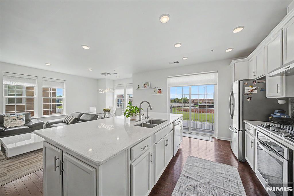 STUNNING 3 BED Townhome in Prime Bergen County Location, available starting August 15th. Welcome to this beautifully done SPACIOUS 2,072 sqft townhome in the vibrant neighborhood of Wood Ridge. Rare rental offers exceptional value for families seeking modern comfort with NYC convenience. Home Features- * 3 Spacious bedrooms with NEW Carpet and ample closet space * LUXURIOUSLY DONE KITCHEN WITH SS APPLIANCES, RECESSED LIGHTS AND UPGRADED CABINETS. * OPEN-CONCEPT MULTI LEVEL LAYOUT, COZY BALCONY FACING THE PLAYGROUND / FIELD * 2,072 square feet of functional living space * NEWLY RENOVATED & FRESHLY PAINTED. READY TO MOVE IN * 1 Car Garage & 1 Car Driveway Neighborhood & Commuter Benefit * NJ Transit station, direct bus to city just steps away. 30-minute commute to Hoboken & NYC * PRIME LOCATION near Route 17 and NJ Turnpike * On Site retail, liquor, coffee shop, parks, playgrounds, and sports field * Close to American Dream Mall, MetLife Stadium and top dining Community Living in Bergen County's sought-after town. Perfect for those who want suburban comfort with urban convenience.