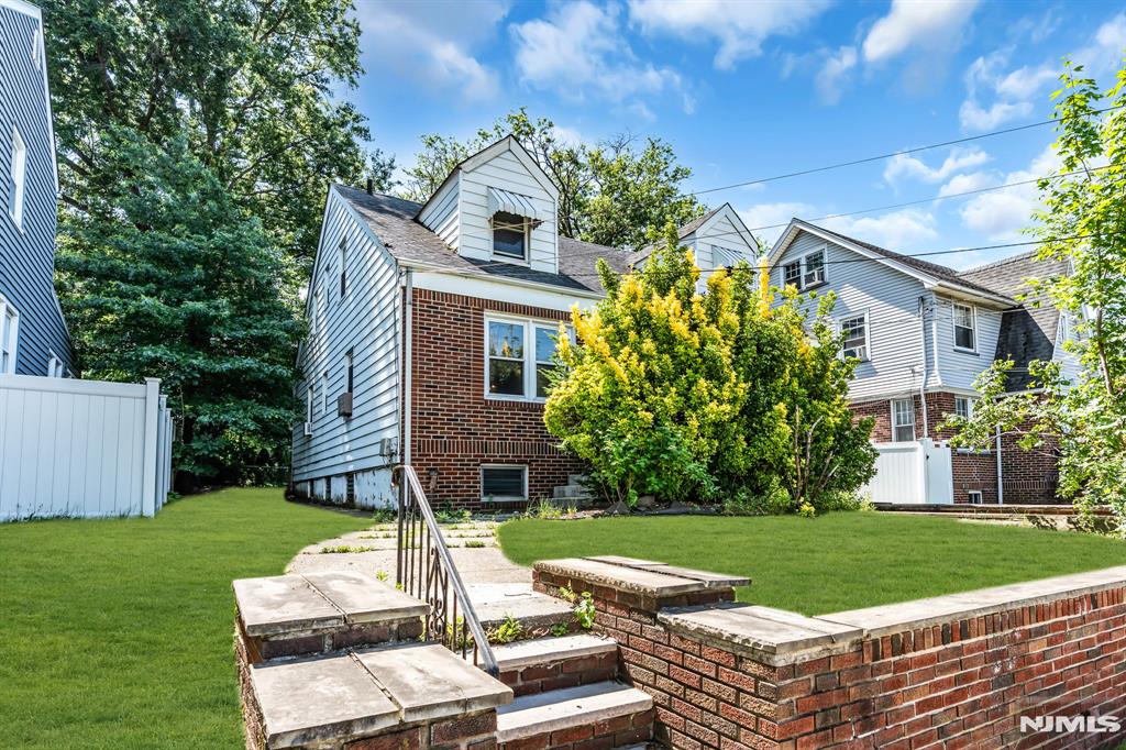 Discover Your Spacious Family Home in Kearny's Desirable Manor Section! A rare opportunity to own a substantial single-family home in one of Kearny's most sought-after neighborhoods. This large residence offers 5 bedrooms (2 on the first floor and 3 on the second floor) and 2 full baths, plus a 4-season room off the kitchen â€” perfect for extended family living or multigenerational households. Boasting approx. 1,972 square feet on a generous lot, the home includes off-street parking, a 1-car garage with direct access into the finished basement, private yard, and full basement. Situated in the Manor Section, enjoy proximity to parks, schools, shopping, and easy commuting options. While solid with classic charm, the home needs some TLC â€” a fantastic project for the savvy buyer looking to customize and build equity. Turn this into your dream family home! Don't miss this opportunity in a stable, family-friendly area.