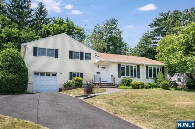 Beautifully renovated and pristine 4 bedroom, 3 bath home available for lease on a quiet, perfectly located street in the desirable town of Glen Rock - with top rated schools and fabulous NYC transportation. Two BR Suites, new stunning kitchen with open floorplan, new central air, gleaming hardwood floors throughout. Long list of updates! Finished basement, attached garage, wonderful backyard. Landlord will provide lawn care and all appliances including washer/dryer. Tenant responsible for utilities, snow removal, renter's insurance, 1st $150 of each minor repair. Credit report, application and interview required. No pets. No smoking.
