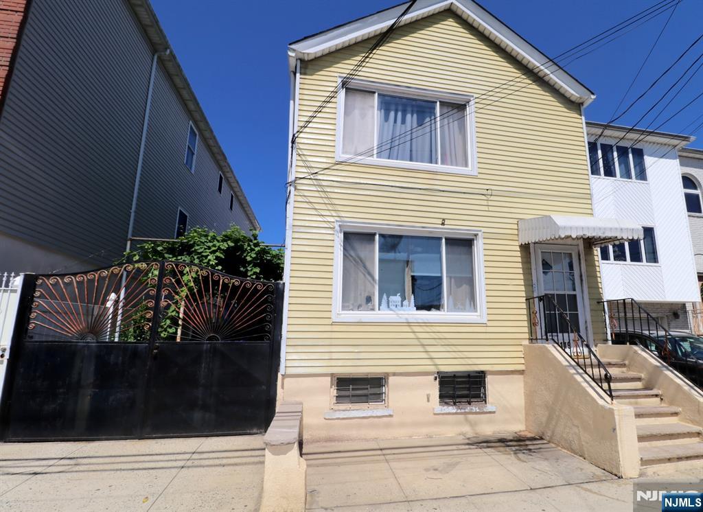 Welcome to 119 Pacific Street! This fantastic, well-maintained two-family home is ideally located in the highly sought-after and vibrant Ironbound section of Newark. Offering spacious and versatile living arrangements, this property is perfect for both owner-occupants and investors alike. The first-floor unit features a generous kitchen, comfortable living room, three spacious bedrooms, and a full bathroom. The second-floor unit offers a similar layout with a large kitchen, living room, three bedrooms, and two full bathrooms, providing ample space and flexibility. Additional highlights include a finished basement, separate utilities, a large driveway, and a detached garage, ensuring convenience and plenty of parking. Enjoy being just moments from the Ironboundâ€™s renowned restaurants, shopping, parks, major highways, and public transportation, making for an easy commute to New York City. Don't miss this incredible opportunity to own a versatile multi-family property in one of Newark's most vibrant and growing communities!