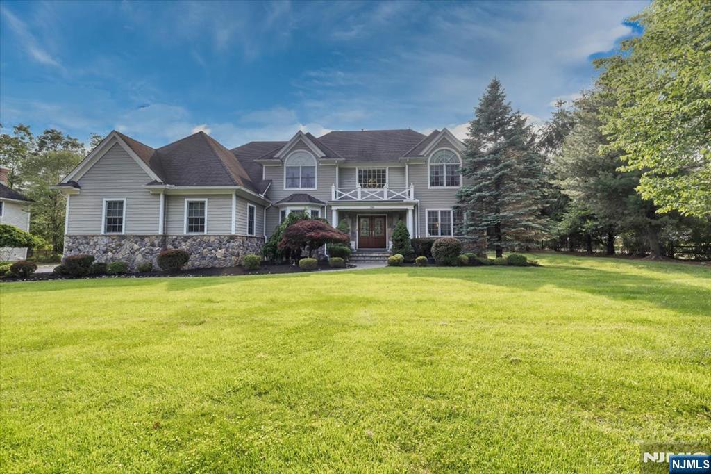 If you love to entertain, this is a winner on so many levels. First time being offered is this 4000+ sq. ft colonial built by Brooks Builders in 2007 on a quiet cul-de-sac located on the upper east side of Mahwah. Fall in love with the details throughout and the flow of the home which offers an open floor plan ideal for entertaining. Stately 2 story entry foyer with double entry door, large formal dining room for hosting holidays, formal living room for intimate conversation, home office for today's professional, large great room with wood burning fireplace open to the gourmet kitchen with large center island. Large windows throughout with stunning views of the lushly landscaped yard. The 4 bedrooms are all on the 2nd level with one room that can be a 5th bedroom (no closet). The primary suite is oversized with a large bathroom and 2 large walk in closets. The fenced in resort like backyard is an entertainer's paradise complete with an outdoor kitchen with fireplace, heated gunite pool with slide, waterfall, and spa. It's the perfect yard for making memories with friends and family. Enjoy the proximity to the ball fields, playground, Secor Farm for pumpkin picking and donuts in the fall. Convenient for commuting into the city by bus or rail. Mahwah has it all including fun events throughout the year! Enjoy Campgaw for skiing, Ramapo Reservation for hiking, Mahwah Day, Annual Townwide Garage Sale, Holiday Decorating Contest, Movie Nights, and so much more. Don't miss out!