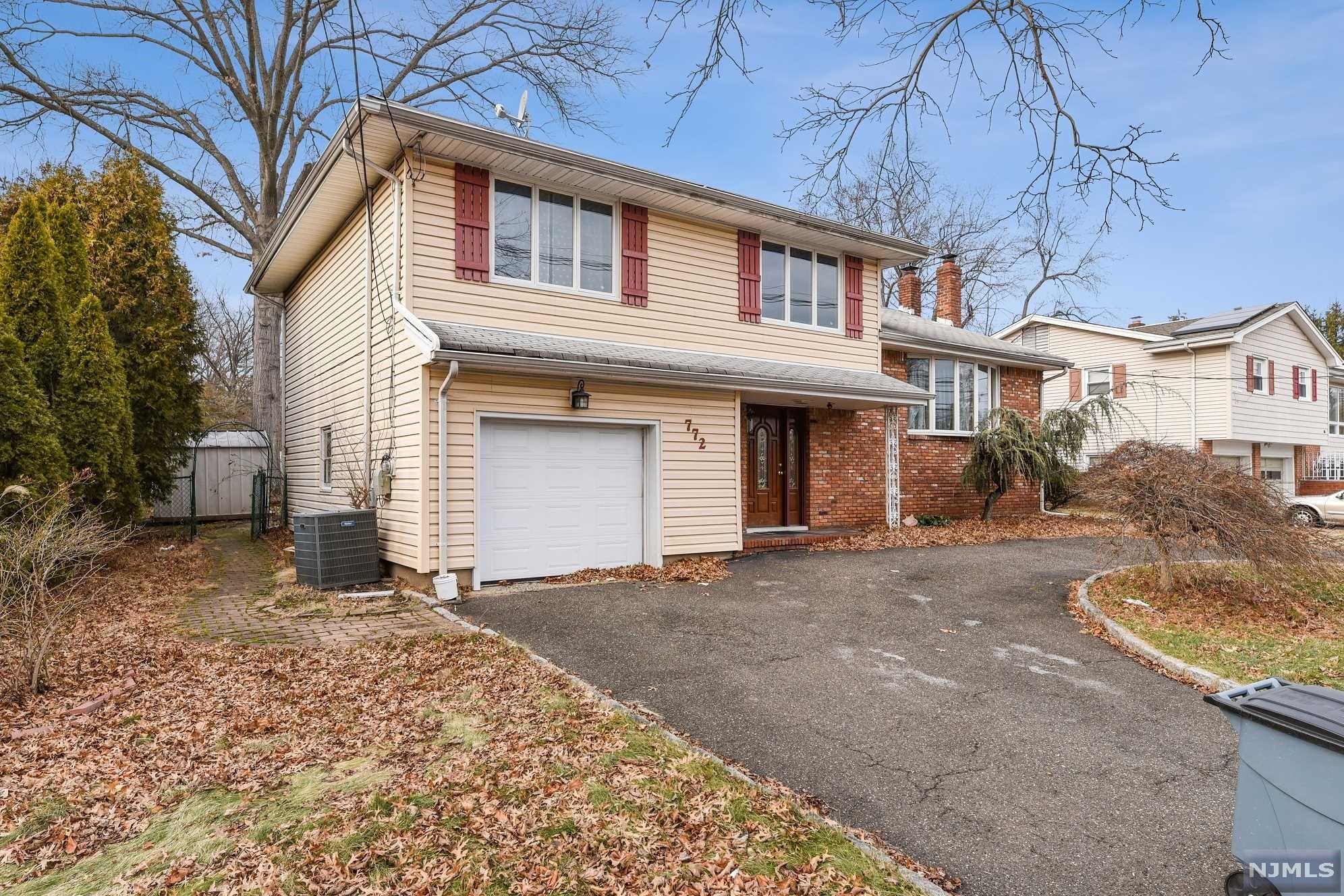 LOCATION, LOCATION! THIS OVERSIZED SPLIT LEVEL IS ALL WHAT YOU WERE LOOKING FOR! LOCATED JUST MINUTES FROM ALL MAJOR HIGHWAYS, SCHOOLS, SHOPS, PARKS AND NYC COMMUTING. THIS HOUSE OFFERS 3 LARGE BEDROOMS, 2.5 BATHROOMS, FULLY FINISHED BASEMENTS WITH WOODBURNING FIRE PLACE, BAR, AND SITTING ROOM. LARGE INVITING FOYER LEADS TO VERY LARGE FAMILY ROOM WHERE ELEGANT FRENCH DOORS GIVE THIS ROOM A CHARACTER. HOUSE OFFERS CENTRAL HEAT, CENTRAL AIR, HARDWOOD FLOORS IN THE MAIN PART OF THIS HOME, VERY LARGE BACKYARD AND CIRCULAR DRIVEWAY FOR THE PARKING CONVENIENCE.