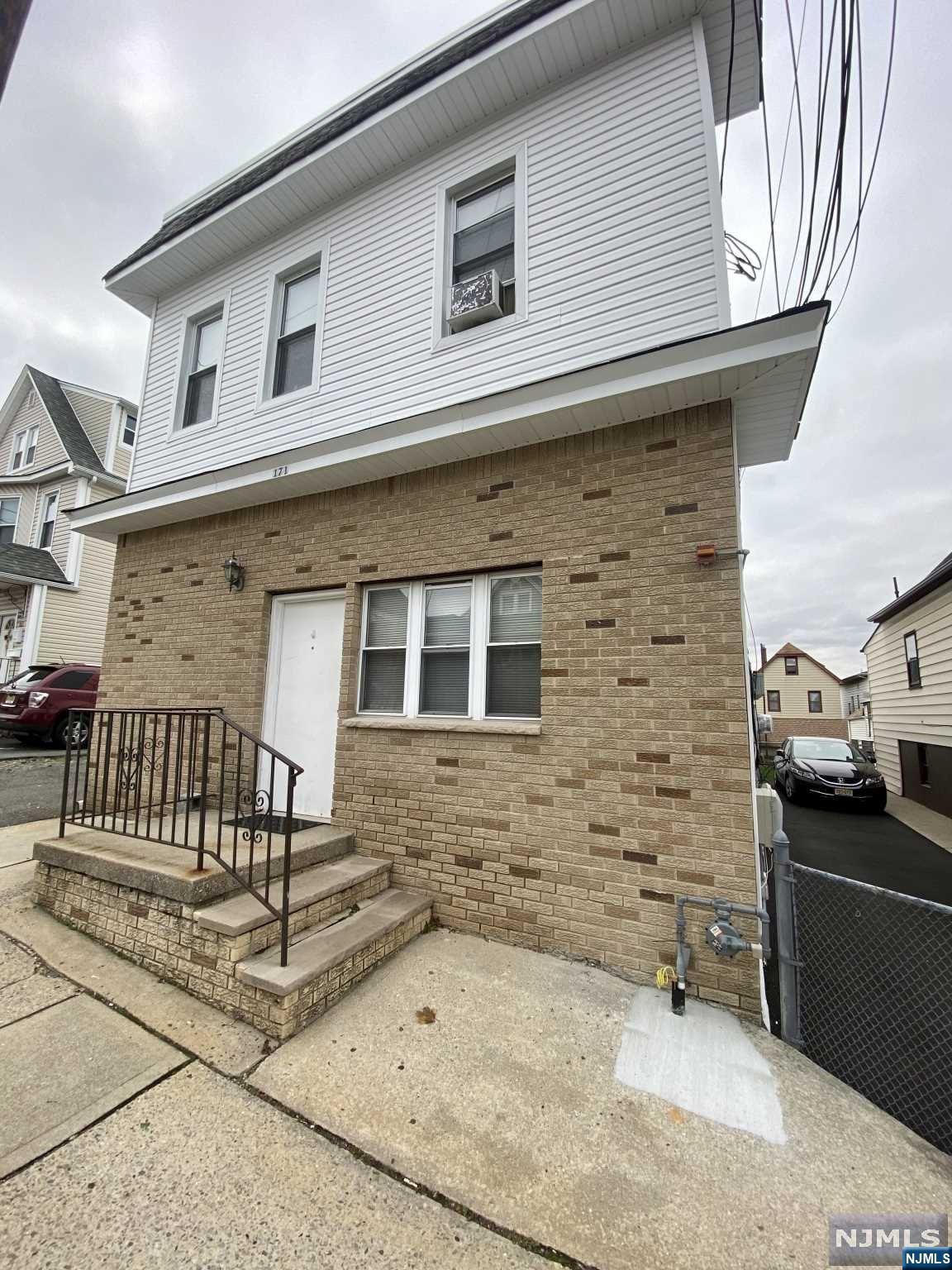Incredible Investment that will see monthly returns and growth in equity!! This 4 family home features a total of (10) bedrooms, parking for 3 cars, laundry and storage for all tenants in the basement, and unbeatable proximity to NYC transportation and highways!!! The units have been very well maintained and all tenants are month to month. The siding is less than a year old. Two front units feature a living room, eat in kitchen, bathroom, and two bedrooms. Two back units feature a large living room, dining room, kitchen, bathroom, and three bedrooms in each unit. The yard, laundry, and parking are shared currently between tenants. Call today, this won't last!