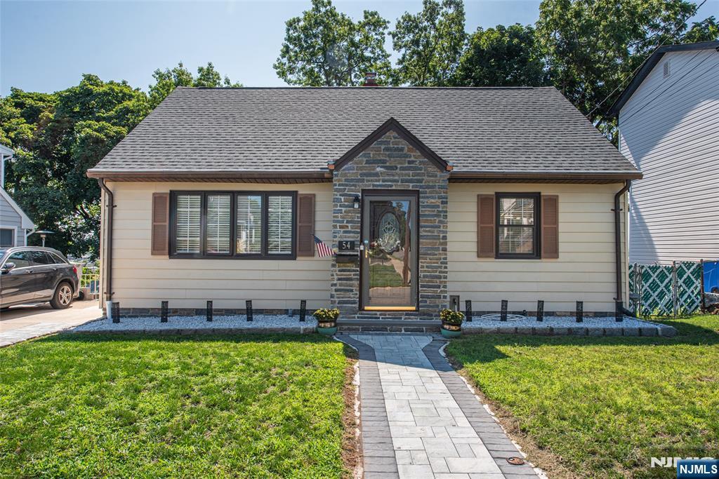 Welcome to this beautifully updated 4-bedroom, 1-bathroom home in the heart of desirable Hasbrouck Heights. Featuring numerous upgrades throughout, this move-in-ready property offers the perfect blend of comfort, style, and functionality. The bright and inviting layout includes spacious living and dining areas, an updated kitchen, and generously sized bedrooms. Step outside to a large deck with breathtaking New York City views, perfect for entertaining, relaxing, or enjoying your morning coffee. The private, tree-lined backyard provides a peaceful retreat with plenty of space for outdoor gatherings, gardening, or play. Additional highlights include a full basement with excellent storage or future finishing potential, hardwood floors, central air, and convenient off-street parking. Ideally located near top-rated schools, parks, shopping, dining, and easy NYC transportation, this home offers the perfect combination of suburban living and city convenience. Don't miss this exceptional opportunity to own a beautifully upgraded home with stunning skyline views in one of Bergen County's most sought-after communities.