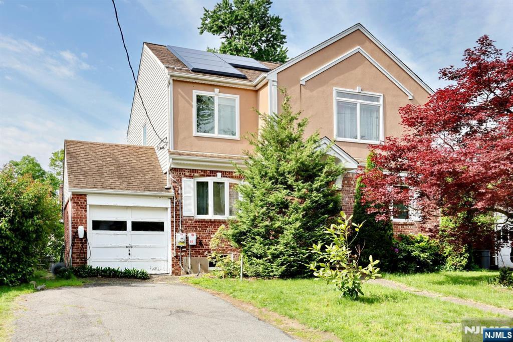 BEST & FINAL 5/26 BY 1:00PM Welcome to 163 Monroe Ave in desirable River Edge, an exceptional opportunity to move into one of Bergen Countyâ€™s most sought-after communities and make this home your own. Nestled on a quiet residential street, this property is conveniently located near top-rated schools in the River Dell Regional School District, parks, shopping, dining, and NYC transportation, including the nearby River Edge Station and express bus service. This 4-bedroom, 2 full bath colonial home offers a versatile layout filled with natural light. The first floor features an entry foyer with coat closet, a comfortable living room, a bright eat-in kitchen with backyard access, two bedrooms, and a full bathroom. A second-floor addition, completed approximately in 2011, adds a spacious family room, two generously sized bedrooms, and a full bath. Additional highlights include a partially finished full basement with abundant potential, large backyard, featuring a versatile Marquis swim spa ideal for relaxation, recreation, or athletic training. Tesla solar panels and a Tesla charger are already installed and fully paid off. With solid bones and tremendous potential, this home is ready for your vision and personal updates. Property is being sold strictly â€œas is.â€