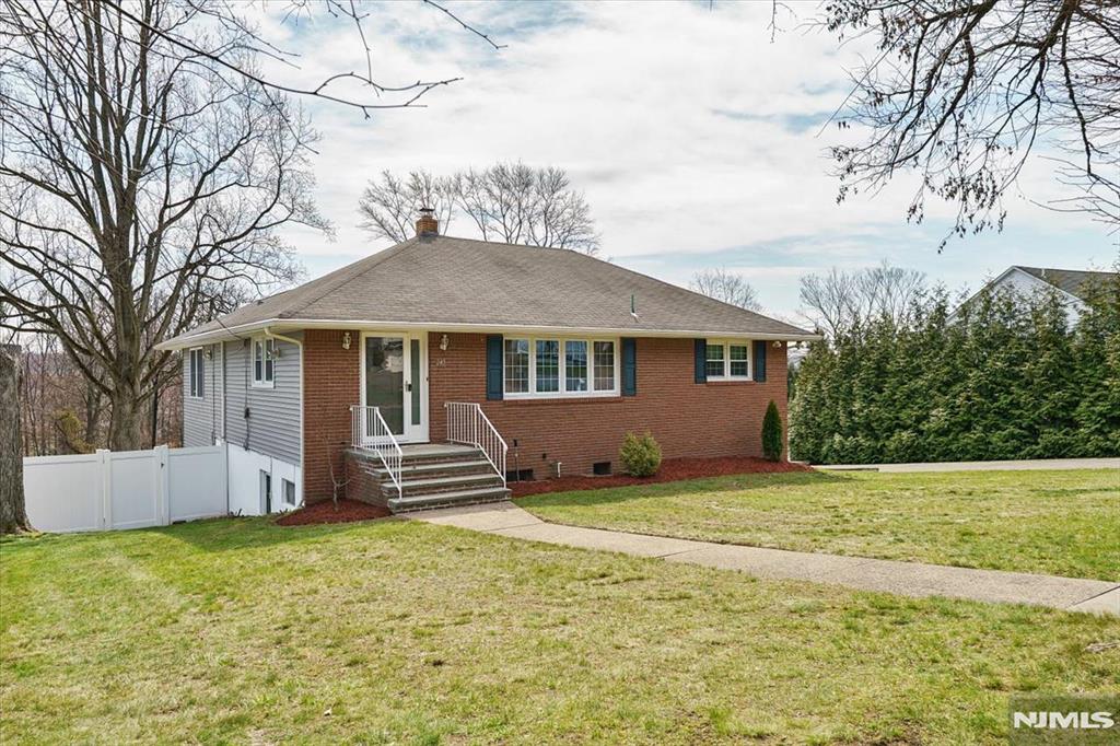 A rare find in Totowa! This custom brick front ranch with in-law suite potential is nestled on a quiet street that backs up to the PAL. Situated on a .67 acre lot, the main level offers 3 Bedrooms, full bath, updated eat-in kitchen with granite counters, vinyl floors and tile back splash, Dining Room, LR , Walk-up attic for storage, Family room addition with gas fireplace and separate heat w/entry to deck. The lower level with a separate ground floor entrance which walks out to the patio features a summer kitchen, dining room, 4th bedroom with huge walk in closet, full bath, living room/family room and a possible 5th BR. Hardwood floors, recessed lighting, central air, replacement windows, A mechanic's or contractor's dream w/ a 2 Car heated garage & loft storage, huge driveway with parking for up to 20 cars! Oversized lot with vinyl privacy fence, underground sprinkler system, newer water heater (2022). All appliances included. Located on a very quiet street in town that backs up to the Totowa PAL. This is the one you have been waiting for! Home to be Sold in "As Is" Condition. Inspections limited to major structural, environmental and wood boring insects.