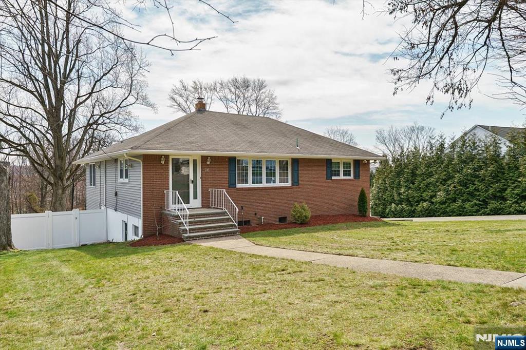 A rare find in Totowa! This custom brick front ranch with in-law suite potential is nestled on a quiet street that backs up to the PAL. Situated on a .67 acre lot, the main level offers 3 Bedrooms, full bath, updated eat-in kitchen with granite counters, vinyl floors and tile back splash, Dining Room, LR , Walk-up attic for storage, Family room addition with gas fireplace and separate heat w/entry to deck. The lower level with a separate ground floor entrance which walks out to the patio features a summer kitchen, dining room, 4th bedroom with huge walk in closet, full bath, living room/family room and a possible 5th BR. Hardwood floors, recessed lighting, central air, replacement windows, A mechanic's dream w/ a 2 Car heated garage & loft storage, huge driveway with parking for up to 20 cars! Oversized lot with vinyl privacy fence, underground sprinkler system, newer water heater (2022). All appliances included. Located on a very quiet street in town that backs up to the Totowa PAL. This is the one you have been waiting for! Home to be Sold in "As Is" Condition. Inspections limited to major structural, environmental and wood boring insects.