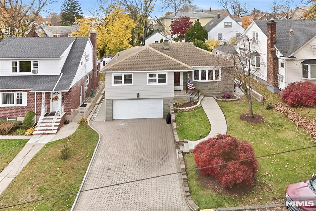 Welcome to 175 Weaver Ave. in Bloomfield, NJ! This 1960's raised ranch is situated on a tree lined street straight out of a storybook. This beautifully maintained home boasts pride of ownership and endless possibilities featuring 4 bedrooms and 2 full bathrooms. This home also features a fully finished basement and an beautiful in-ground pool perfect for entertaining. Location is prime at 175 Weaver as you are walking distance to Fairview Elementary school, Bloomfield Train Station, and parks galore.
