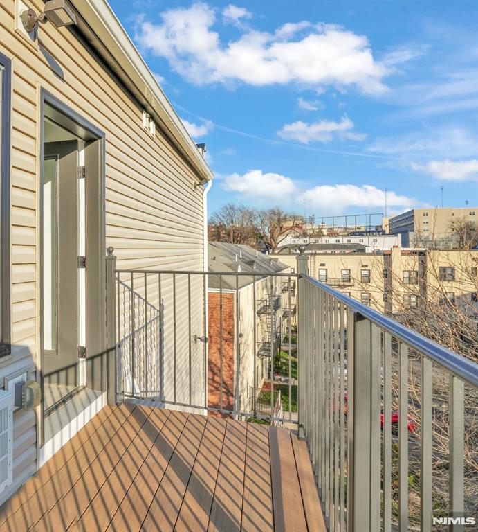 LAST AVAILABLE UNIT IN THIS LINE. Top floor corner 1 bedroom plus den with window, 2 full baths, and terrace in a new construction elevator building with Meadowlands views and abundant natural light. Meadowview Residences is a 12-unit building with open exposures on all sides. This flexible layout offers open concept living, modern kitchen, and in-unit laundry. Private terrace and convenient access to public transportation to Manhattan. Premium indoor garage parking with easy maneuverability available.