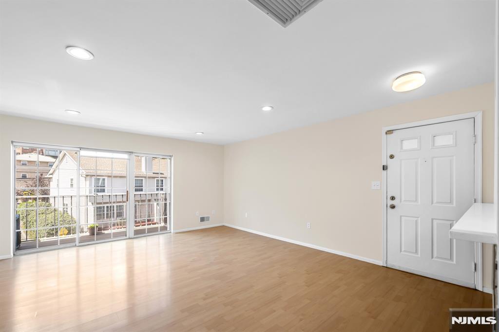 Bright and quiet home to this beautifully renovated 2 Bedroom / 2 Bathroom condo conveniently located in highly sought after Crown Village. Featuring ample sunlight throughout the day, central AC, in-unit washer/dryer, balcony, newer appliances and HVAC, and one outdoor parking space. Main living area includes open concept living room with sliding door to balcony and stunning eat-in kitchen. Kitchen features quartz countertops, custom cabinets, breakfast bar, and dining area. Spacious master bedroom with two closets and ensuite master bathroom, second bedroom, and newly renovated hallway bathroom complete this gorgeous home. Crown Village features outdoor swimming pool, fitness center, and guest parking. Conveniently located near plenty of shopping, restaurants, schools, parks, and transportation to NYC via Ferry or Bus, this is a home you do not want to miss!