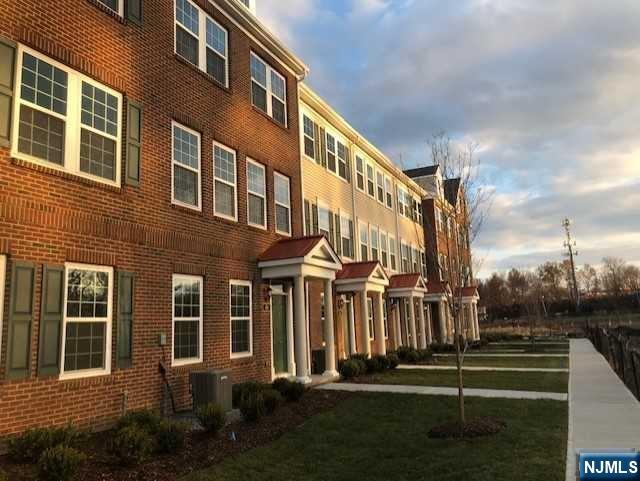 NEWER TOWNHOUSE 3BEDRMS, 3.5 BATHROOMS IN SOUGHT AFTER TOWN WITH TRAIN STATION TO NYC AND GEAT SCHOOLS. HARDWOOD FLOORS THROUGHOUT. OPEN CONCEPT KITCHEN, DOUBLE DOOR PANTRY, LIVING AND DINING AREA ON MAIN FLOOR, FIRST FLOOR HAS AN OFFICE/DEN OR POSSIBLE GROUND LEVL BEDROOM AND FULL BATHROOM. QUIET LOCATION CLOSING MUST TAKE PLACE AFTER 6/15. 90-120 DAY CLOSING OWNER HOLDS NJ REAL ESTATE LICENSE