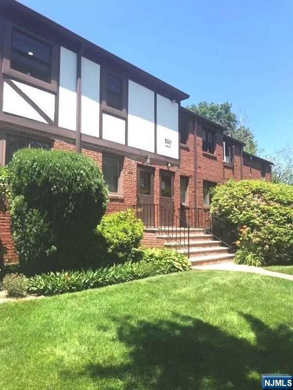 Welcome to this spacious 1-bedroom, first-floor condo located in a charming European-style courtyard setting just minutes from New York City. This well-designed unit features a functional layout with generously sized rooms and ample closet space. Beautiful hardwood floors run throughout the home, complemented by a separate living room and dining area. The full bathroom is finished with ceramic tile and includes a tub and shower. The unit also offers a fully equipped galley kitchen with all appliances, as well as in-unit laundry hookups and additional storage in the basement. A one-car garage (#7) is included. The property is conveniently located within walking distance to parks, houses of worship, schools, shops, and public transportation, with easy access to all major highways and direct NYC transportation right at your doorstep. The unit is currently tenant-occupied with a lease in place through March 30, 2027, generating a monthly rent of $2,300â€”making it an excellent investment opportunity.