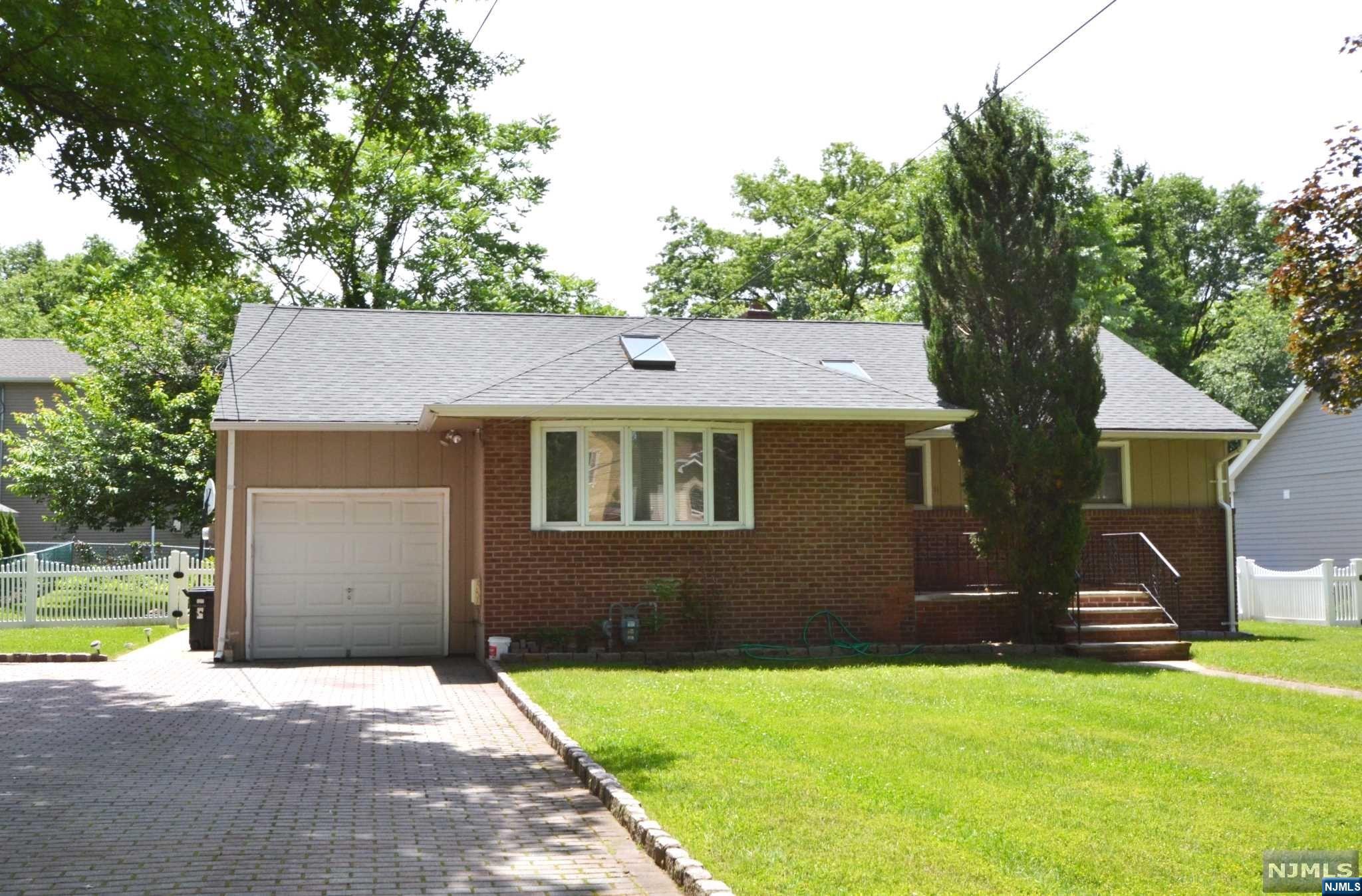 Welcome to this well maintained beautiful Ranch nestled on a desirable, peaceful street. As you enter this charming home, an inviting entry foyer sets the tone, leading into the living room that seamlessly flows into the dining room. Updated eat-in-kitchen with stainless-steel appliances and cermeric tiles. Three nicely sized bedrooms & updated full bathoom. Full finished basement, with rec room, full bathroom, bar, laundry and plently of storage space. Additional features includes hardwood floors, new Central AC, 1 Car Attached Garage, Paver drieway. All this and a beautiful fenced in backyard. Convenient location to schools & NYC transportation. HIGHEST AND BEST DUE TUESDAY 7/11 BY 5:00 PM