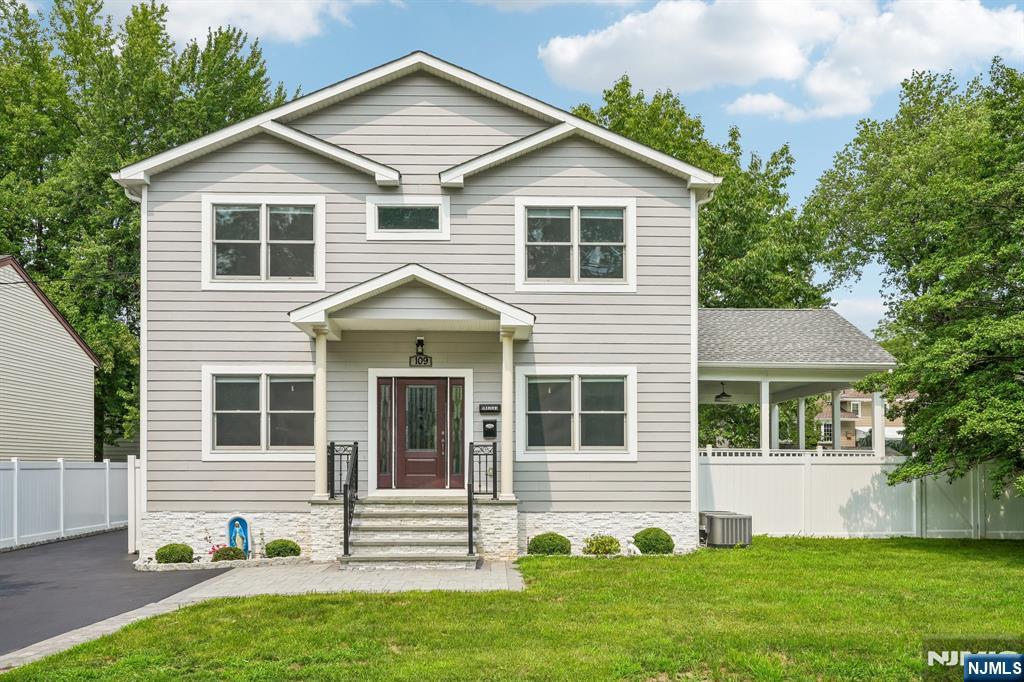 Welcome to this exceptional 2,600+ sq. ft. Colonial in the highly sought-after town of Paramus, completely rebuilt in 2021 on the original foundation and thoughtfully designed for today's luxury lifestyle. Sun-filled living spaces include an elegant formal living room, dining room, spacious family room, eat-in kitchen, office/pantry, and powder room. French doors open to a large covered deck overlooking the private backyard, creating a seamless indoor-outdoor living experience ideal for entertaining or relaxing. Upstairs offers 4 spacious bedrooms and 3 full baths, including a primary suite with a private bath. The home features durable, low-maintenance Hardie Plank siding for lasting beauty and curb appeal. An oversized detached 1-car garage with finished bonus space provides endless possibilities for a home office, fitness studio, recreation room, or creative retreat. Conveniently located near top-rated schools, premier shopping, dining, major highways, public transportation, and offering an easy commute to New York City.