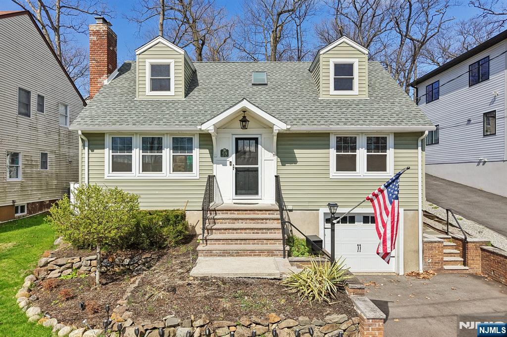 Beautifully updated home in the sought after Packanack Lake community, stylish open floor plan with newer modern upgrades, amazing lifestyle, including pool and lake living- Welcome home! Features include: a desirable open-concept formal LR w/ fireplace, spacious DR & a newer Kit with high-end appliances, upgraded cabinets and countertops, + a large center island. 4-seasons sunroom offers a bright, sun-filled room with many options for living based on your needs. 1st floor also includes: newer full BTH and 2 nicely sized BRs (1 currently used as laundry rm - W/D can be moved to BSMT - hook-ups already in place). 2nd FL includes: newer full BTH with cathedral ceilings and skylights, + 2 additional lge BRs. Step outside to your private retreat: large patio, a heated saltwater inground pool & lake views create a resort-like setting right at home. Wonderful for a party with your friends or a relaxing quiet evening at home, this home is perfect for entertaining all year long. Add'tl attributes: Recessed lighting, HDWD Flrs throughout, lge ready-to-finish BSMT w/storage, 1-car gar, updated charming exterior, newer fence. Everything is very well maintained. Enjoy your perfect lifestyle with all that Packanack Lake has to offer: Swimming, beaches, park, community activities, boating, with golf and tennis available. Great Location: top rated schools, minutes to lake, restaurants, shopping, Trader Joe's, Whole Foods, major highways, town library and NJ Transit Bus and Train Center.