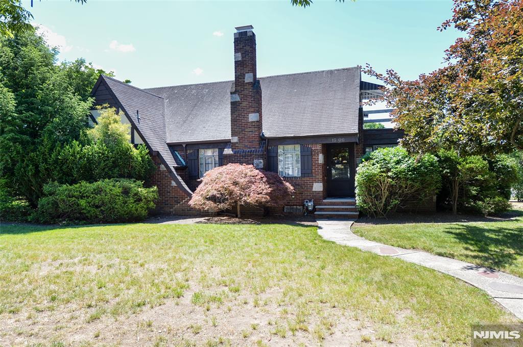 Filled with years of love, laughter, and cherished memories, this charming Fair Lawn home is ready for its next chapter. A welcoming entry foyer sets the tone for the warmth found throughout. The inviting living room centers around a beautiful fireplace, creating the perfect setting for cozy evenings, while a sunlit sitting room flows into the formal dining room, offering a wonderful space to gather. The kitchen connects to a bright three-season room, ideal as a peaceful retreat,or extension of your living space. The first floor also features two spacious bedrooms and a full bathroom. Upstairs, two additional bedrooms and a second full bath provide comfortable accommodations, with one bedroom enjoying access to a private porch, an ideal spot to enjoy your morning coffee or unwind at the end of the day. Attic storage adds even more convenience. The finished basement is paneled and carpeted, offering a warm and flexible extension of living space with a rec room, laundry area, powder room, abundant storage, a wine cellar, and a tucked-away bar that serves as a true hidden gem. Direct access to the two-car garage adds everyday convenience. Situated on an oversized corner lot with vehicle access from Lyncrest Avenue, additional highlights include central air and a location convenient to Fair Lawnâ€™s parks, shopping, dining, schools, and NYC transportation. Lovingly maintained through the years, this home is ready to welcome new memories for years to come.