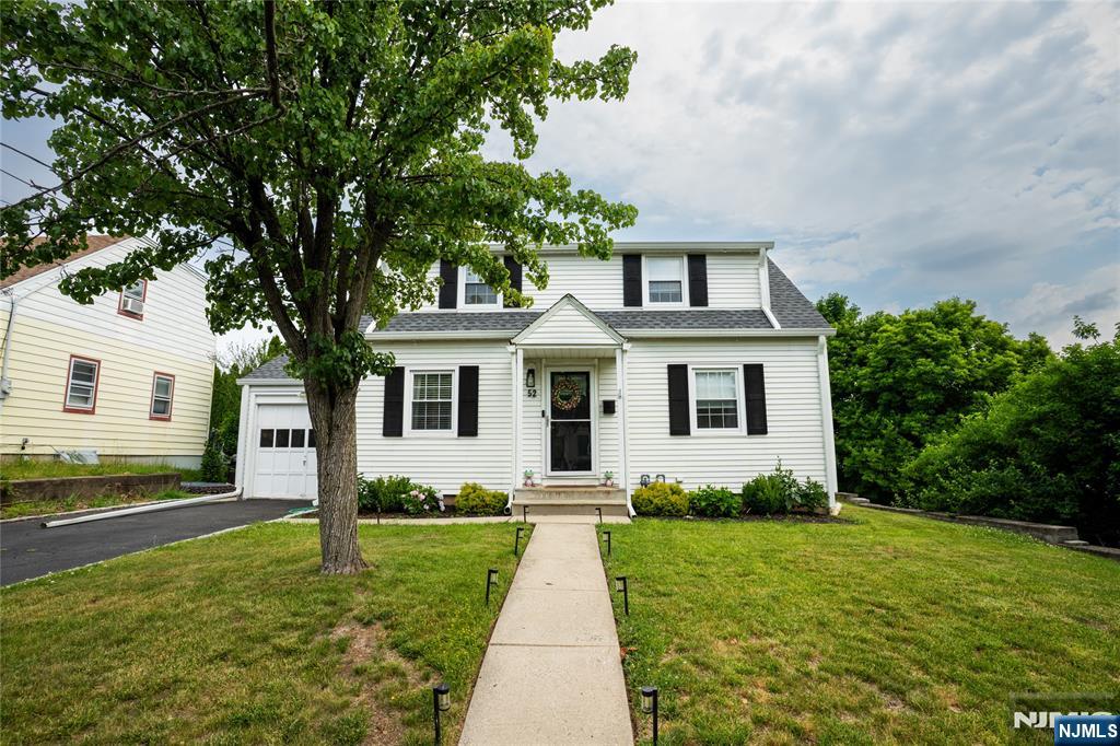 Welcome home to this lovely move-in ready 3-bedroom, 2-bath home located in Clifton's highly desirable Allwood section! Whether you're a first-time buyer or looking to downsize without compromising space, this home offers comfort and convenience. The main level features a bright and inviting living room with a fireplace, an updated kitchen, a dining room with access l to a Trex deck overlooking a private backyard perfect for weekend barbecues, entertaining friends, or simply relaxing outdoors. Two generously sized bedrooms and an updated full bath complete the first floor.Upstairs, you'll find a private primary bedroom retreat with its own full bath, offering the ideal space to unwind at the end of the day. The finished basement provides even more living space with a family room or bonus room, perfect for a home office, gym, playroom, or movie nights, plus a workshop and plenty of storage.Additional highlights include CAC throughout, updated baths, and a layout designed for today's lifestyle. Conveniently located near NYC transportation, Route 3, major highways, shopping, restaurants, and just minutes from the American Dream Mall. Simply unpack and start making memories in this wonderful home!