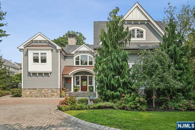 Welcome to this most special property designed and built in 2017 to merge interior and exterior space in a grand yet practical manner. Attention to detail for contemporary high-end living is evident throughout the 7 bed 4.5 bath home, ideal for supporting large and multi-generational families. The outcome is nothing short of sensational. Chef's kitchen with Wolf appliances, 3 sinks, quartz counters and custom walnut dining table. Main level primary suite. Second level offers 5 bedrooms - each has special appeal, like access to deck with stairs to yard or Jack 'n' Jill set-up. There's also a transition area used as a library with a built-in bookcase which is a secret entry to massive garage attic/potential bonus room. Lower level family room/au pair suite. Elliptical staircase connects all 3 levels. The resort-like backyard features 30,000 gallon salt water pool, hot tub and outdoor kitchen. Grounds curated by master gardener. See document tab for all details and list of amenities.
