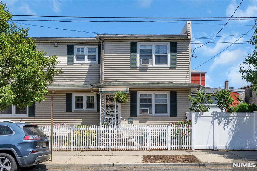 Excellent opportunity to own a well-maintained two-family home in the heart of Harrison. Perfect for both owner-occupants and investors, this property features a vacant second-floor unit, offering immediate occupancy or the ability to generate market rental income from day one. The home has been lovingly cared for and offers spacious living areas, separate utilities, and a functional layout. Conveniently located near schools, shopping, restaurants, major highways, and public transportation, including easy access to the PATH train/Penn Station for commuters. Whether you're looking to live in one unit while collecting rental income or expand your investment portfolio this property is a must-see!