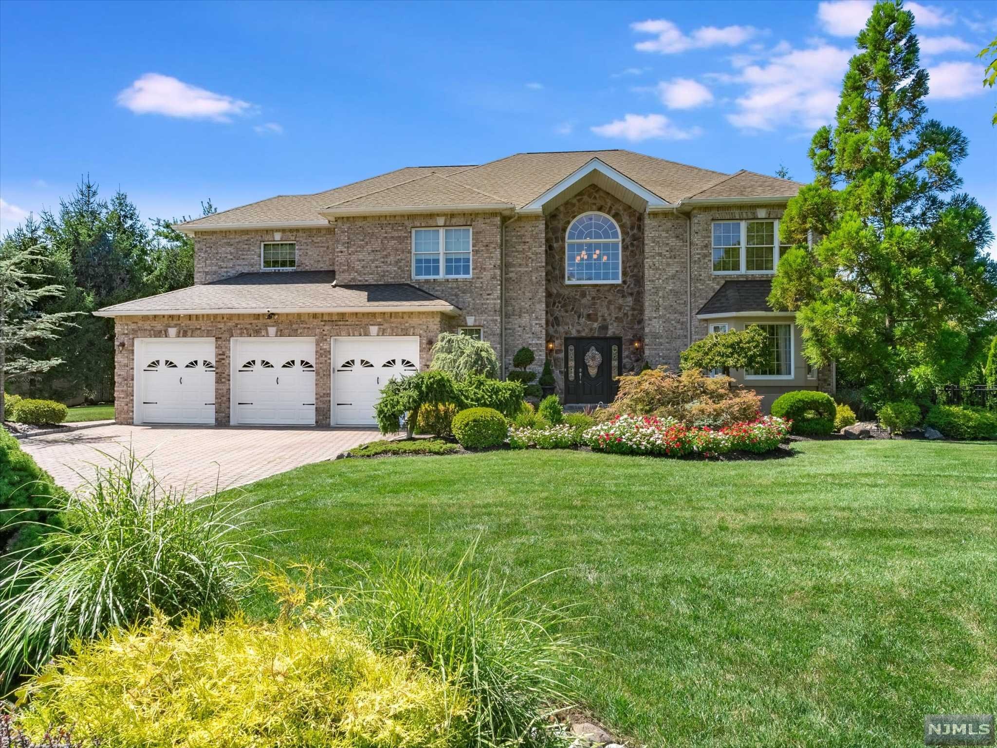 Seller's Request Highest & Best by Wed 9/14 5pm Spectacular Colonial in Pristine Condition! Fantastic Cul De Sac Location! Home Features 2 Story Entry Foyer, Custom Trim Work, Living Rm W/ Built in Book Shelves, Dual Gas Fireplace to Oversized Formal Dining Room w/ Coffered Ceilings, MEIK w/2 story Dining Area, walk in Pantry, Large Family Rm w/Fireplace, Built In Book shelves, Hardwood Floors, Master Bedroom w/2 walk in California Closets, Master Bath, Laundry Rm on 2nd Fl, 3 additional Bedrooms, C/Air, C/Alarm, sliders to Brick Paver Patio, Custom I/G Heated Pool w/Waterfalls, Wired for TV & Outdoor Speakers, Professional Landscaped, Brick Paver Driveway, 3 Car Garage! This home is a must see!
