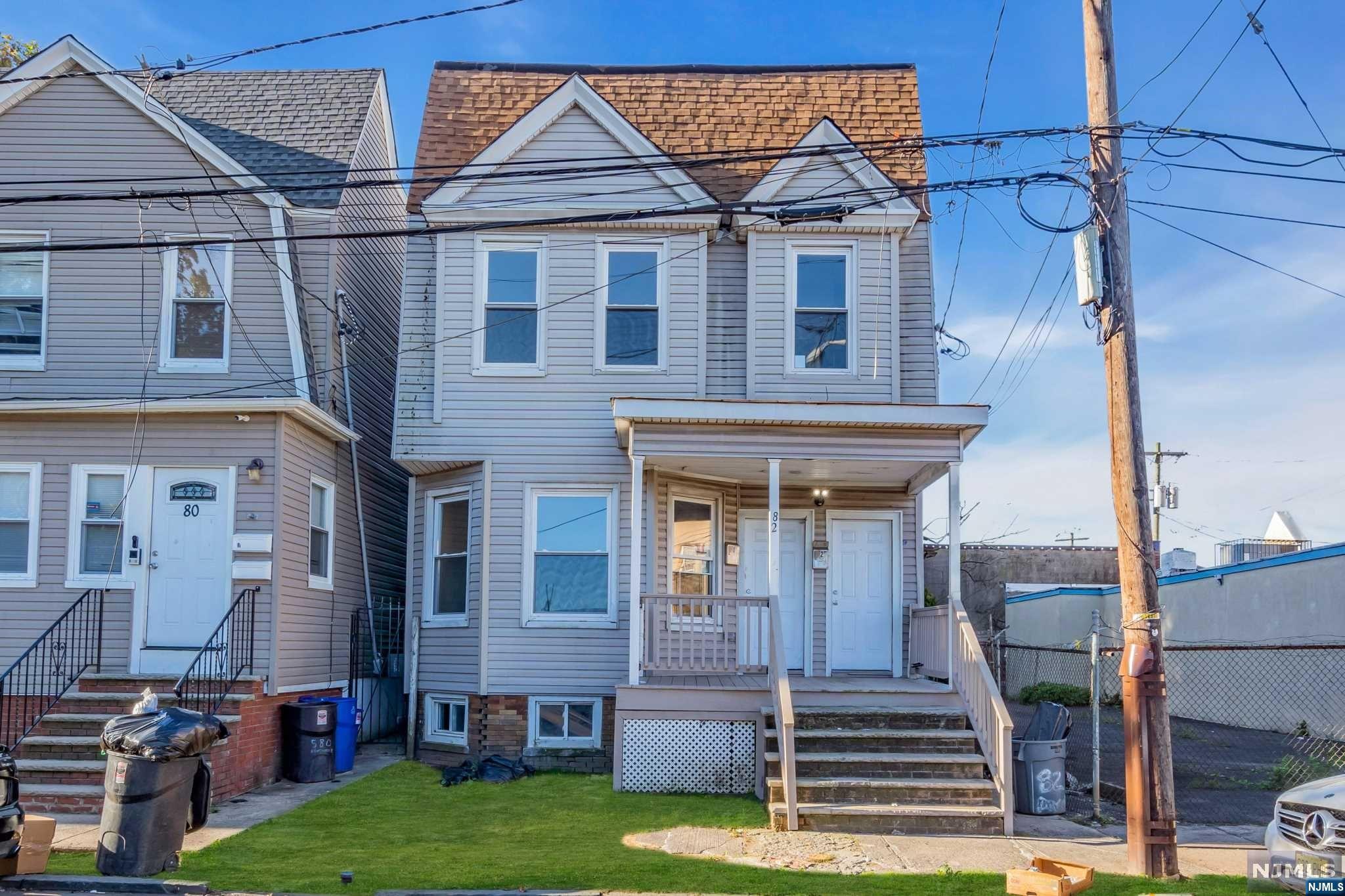Introducing 82 Beverly St., a remarkable "fully vacant" 2-family residence located on the Irvington-Newark border. Each unit offers 3 bedrooms and 2 full bathrooms for your comfort and convenience. Unit 1: This fully renovated space features a brand new spacious kitchen with stainless steel appliances, including a stove and dishwasher. Enjoy breakfast at the elegant bar with pendant lights. Additionally, two beautifully tiled bathrooms, including an ensuite in the master bedroom, provide both luxury and convenience. Unit 2: The second unit, in decent condition, also offers three bedrooms and two full bathrooms, making it a versatile space for a tenant. Outside, a private backyard awaits your gardening, entertaining, or relaxation. An unfinished basement provides ample storage to meet your specific needs. Situated on the Irvington-Newark border, this property offers easy access to transportation, shopping, dining, and entertainment. Whether you're an investor seeking rental income