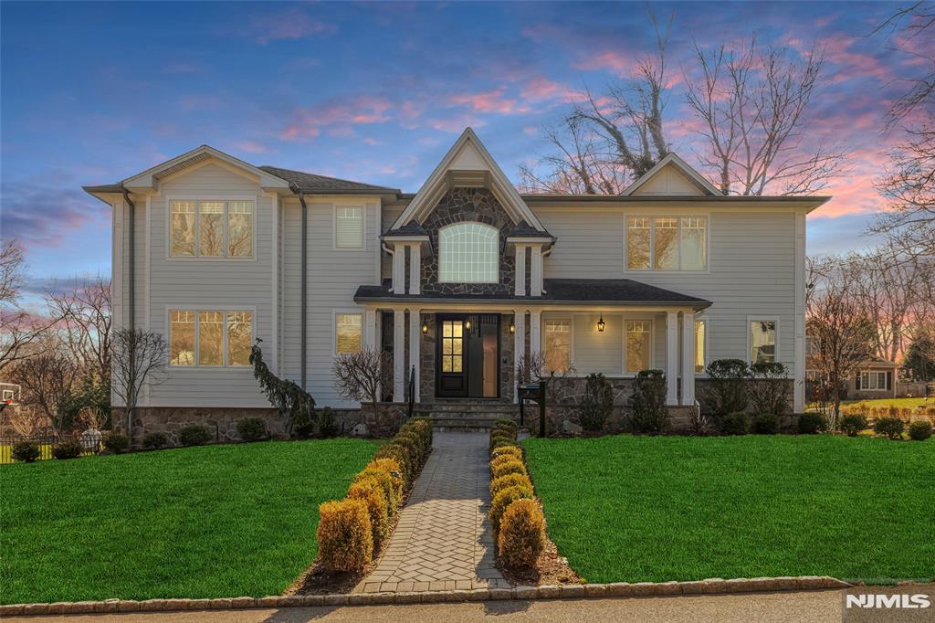 Nestled on one of the most coveted town, 41 Sunset Rd is a crafted luxury estate that blends timeless elegance with modern sophistication. Set on beautifully landscaped grounds, this exceptional residence offers a private retreat just minutes from New York City. A grand two-story foyer welcomes you into expansive living spaces defined by soaring ceilings, custom millwork, and abundant natural light. The gourmet chefâ€™s kitchen is a true centerpiece, featuring top-of-the-line appliances, bespoke cabinetry, and an oversized center island that flows seamlessly into the sunlit family roomâ€”perfect for both everyday living and upscale entertaining. The home boasts generously sized bedrooms, including a lavish primary suite with a spa-inspired bath, walk-in closets, and serene views of the outdoor pool retreat. Additional highlights include a formal dining room, elegant living room, private home office on the first floor and a fully finished lower level with recreation and wellness spaces. Step outside to your own resort-style oasis, complete with a spacious patio, lush gardens and ample room for outdoor gatherings. Every detail has been thoughtfully designed to offer comfort, style, and privacy. Located in the prestigious town of Demarest, known for its top-rated schools and tranquil suburban charm, this extraordinary property presents a rare opportunity to experience luxury living at its finest.