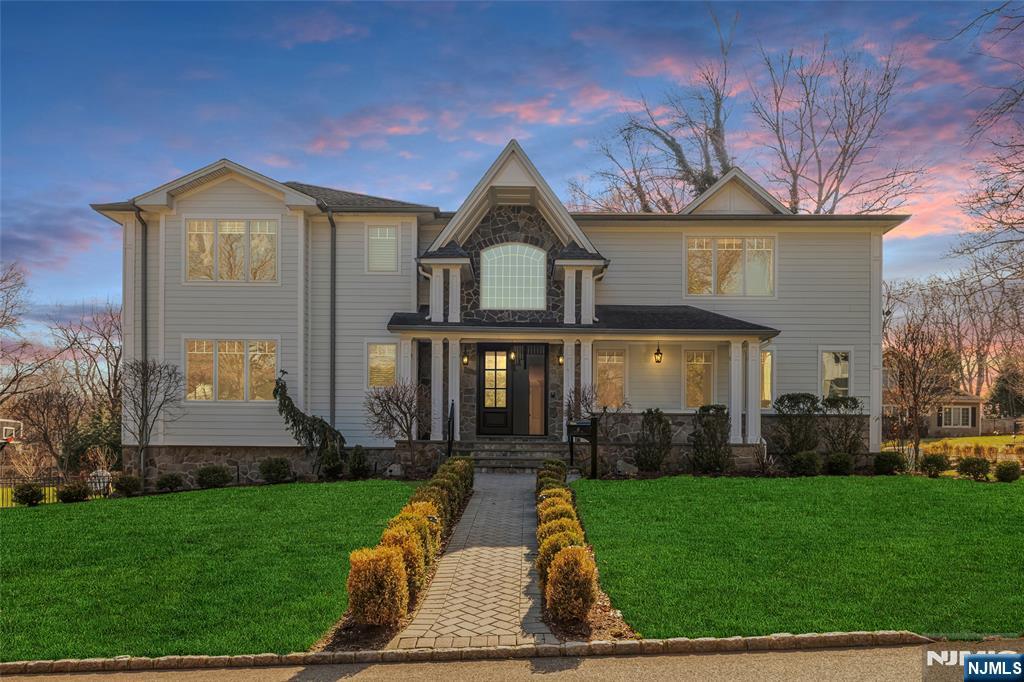 Nestled on one of the most coveted town, 41 Sunset Rd is a crafted luxury estate that blends timeless elegance with modern sophistication. Set on beautifully landscaped grounds, this exceptional residence offers a private retreat just minutes from New York City. A grand two-story foyer welcomes you into expansive living spaces defined by soaring ceilings, custom millwork, and abundant natural light. The gourmet chefâ€™s kitchen is a true centerpiece, featuring top-of-the-line appliances, bespoke cabinetry, and an oversized center island that flows seamlessly into the sunlit family roomâ€”perfect for both everyday living and upscale entertaining. The home boasts generously sized bedrooms, including a lavish primary suite with a spa-inspired bath, walk-in closets, and serene views of the outdoor pool retreat. Additional highlights include a formal dining room, elegant living room, private home office on the first floor and a fully finished lower level with recreation and wellness spaces. Step outside to your own resort-style oasis, complete with a spacious patio, lush gardens and ample room for outdoor gatherings. Every detail has been thoughtfully designed to offer comfort, style, and privacy. Located in the prestigious town of Demarest, known for its top-rated schools and tranquil suburban charm, this extraordinary property presents a rare opportunity to experience luxury living at its finest.