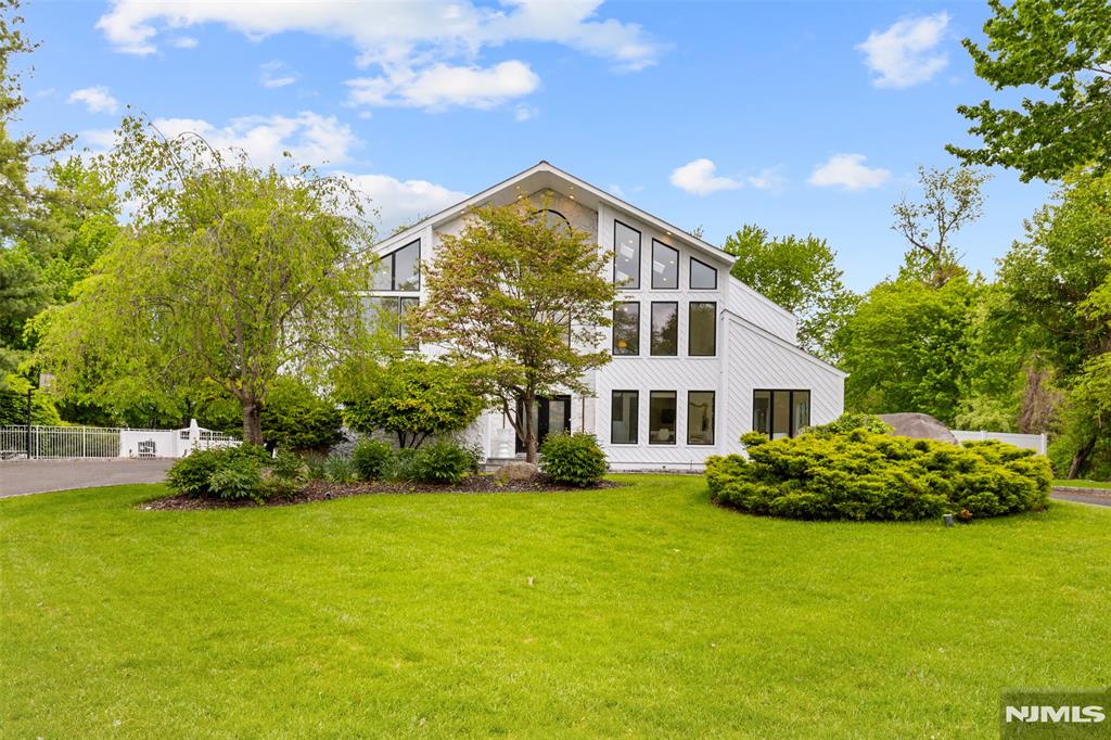 EXPERIENCE REFIND LUXURY & RESORT-LIKE LIVING IN FULLY GUT-RENOVATED ESTATE ON OVER 1.2 AC AT THE END OF A QUIET CUL-DE-SAC.THOUGHFULLY REDESIGNED W EXCEPTIONAL CRAFTSMANSHIP & SOPHISTICATED FINISHES, FEATURING 6 SPACIOUS BEDRM, 4 FULL BATH,AND A STUNNING DESIGNER POWDER RM.A TRULY UNIQUE HIGHLIGHT IS THE COMPLETELY SEPARATE TWO -STORY IN-LAW SUITE FEATURING ITS OWN PRIVATE LOFT AND BEAUTIFULLY APPOINTED FULL BATH, OFFERING EXCEPTIONAL PRIVACY AND FLEXIBILITY FOR EXTENDED FAMILY OR GUESTS.AT THE HEART OF THE HOME IS A STUNNING DESIGNER CHEF'S KITCHEN EQUIPPED W PREMIUM FINISHES & AN OVERSIZED CENTER ISLAND PERFECT FOR DAILY DINING.THE KITCHEN SEAMLESSLY FLOWS INTO THE FORMAL DINING RM COMPLETE W A STYLISH WET BAR, CREATING AN EFFORTLESS ENTERTANING EXPERIENCE FOR INTIMATE DINNERS AND LARGE-SCALE CELEBRATIONS ALIKE.THE MASTER SUITE SERVES AS A PRIVATE RETREAT W A COZY FIREPLACE,SPA-INSPIRED BATH W SKYLIGHT,OVERSIZED GLASS SHOWER,SOAKING TUB,DOUBLE VANITY,SEPERATE TOILET,AN EXPENSIVE CUSTOM RM.EACH FLOOR OFFERS ITS OWN EXPANSIVE SITTING RM/FAMILY RM, ALLOWING EVERY LEVEL TO FUNCTION INDEPENDENTLY FOR A VARIETY OF LIVING ARRANGEMENTS,GUEST ACCOMMODATIONS,OR HOME OFFICES.THE EXTERIR BEAUTIFULLY REIMAGINED W A STRIKING MODERN FACADE.RESORT-CALIBER AMENITIES-NEW HEATED SWIMMING POOL,TENNIS AND TWO PICKLEBALL COURT.THIS REMARKABLE HOME OFFERS A RARE LIFESTYLE EXPERIENCE REMINISCENT OF A PRIVATE LUXURY RESORT FOR THOSE WHO APPRECIATE ELEGANCE,PRIVACY,TIMELESS SOPHISTICATION.