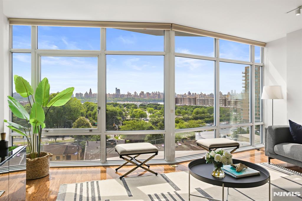 (Contact NELSON CHEN at 2 0 1 - 8 8 6 - 8 0 0 0) - Welcome to Residence 6B at AVENTINE. This magnificent duplex offers an astounding 1891-SF highlighted by the building's signature faceted floor-to-ceiling windows. These eastern facing full walls of glass provide panoramic views and bathe the home in glorious light. Inside you'll discover all the modern design features you've been looking for. The main living level is anchored by a center island kitchen with quartz waterfall counters. Upstairs you'll find two soothing bedroom suites. The primary suite is a true sanctuary with a spa-like bath and custom fitted walk-in closet. Dedicated alcoves on both levels provide the perfect additional space for a home office and a bar area. Exquisite finishes, beautiful oak floors, generous storage space, 2-zone central heat & air-conditioning, bedroom level laundry room and 2 garage parking spaces complete this very special offering. HOA base fee = $948.91; hurricane Ida assessment = $654.01; total monthly = $1602.92 - (Presented by THE CHEN AGENCY, 2 0 1 - 3 4 6 - 8 8 8 8, N e l s o n @ C h e n A g e n c y . c o m)