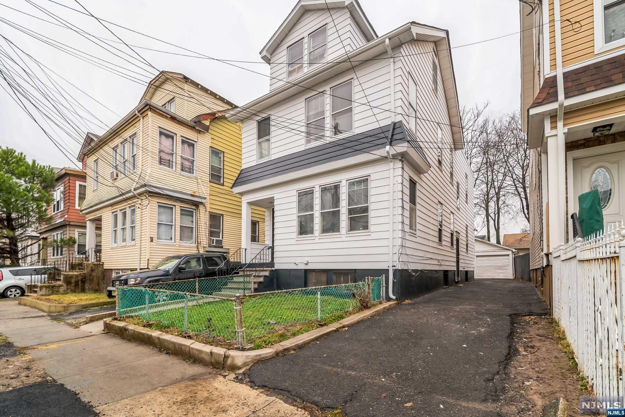 Back on Market due to Buyer's Non-Performance. Recently renovated Two Family home in Irvington. This Multi-family home contains two separate units consisting of a 2 bedroom, 1 bathroom and a 3 bedroom 1 bathroom; with a half bathroom in the basement. The home also has a two-car garage with a driveway large enough to comfortably fit 3-4 cars. Prime location in proximity to schools, shopping and ensures easy access to the highway & access to NYC transportation. Underground Oil tank recently removed. Don't miss this chance!