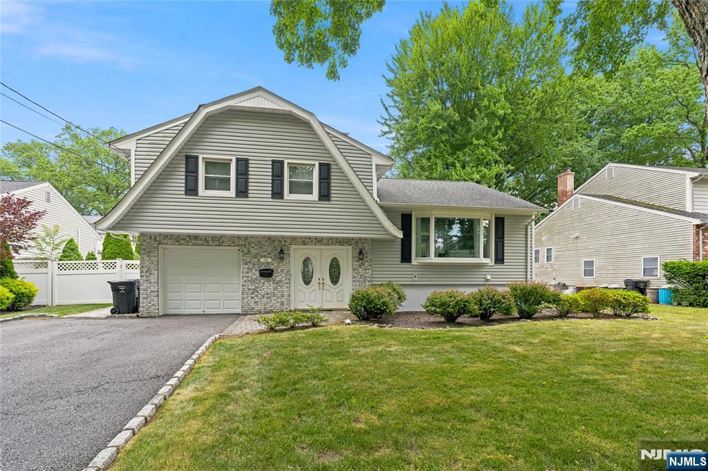 LOCATION, LOCATION, LOCATION -STEP INTO SPACE, STYLE, COMFORT AND CONVENIENCE WITH THIS GORGEOUS 3 BEDROOM, 2 FULL BATH SUGAR MAPLE SPLIT LEVEL NESTLED ON A LOVELY CUL-DE-SAC. THE LARGE ENTRY FOYER WELCOMES YOU WITH FRENCH DOORS TO A LARGE UPDATED FAMILY ROOM WITH FULL BATH & ACCESS TO THE OUTDOOR PATIO, THERE IS AN EASY FLOW ON THE FIRST FLOOR BEGINNING WITH THE LIVING ROOM WHICH NATURALLY FLOWS INTO THE DINING ROOM AND MEIK. ADDITIONALLY THERE IS A LARGE DOUBLE DECK WITH SGD OFF THE DINING ROOM OVERLOOKING THE LARGE, PLUSH BACKYARD PERFECT FOR RELAXING AND ENTERTAINING. THE SECOND FLOOR OFFERS 3 BEDROOMS WITH LARGE CLOSETS AND A FULL BATH WITH ACCESS TO THE ATTIC. THERE ARE HARDWOOD FLOORS THROUGHOUT COVERED BY NEW WALL TO WALL CARPETING. A FULL FINISHED LOWER LEVEL PROVIDES AN EXTENSION OF THE HOME'S LIVING AREA WITH AMPLE SPACE TO ACCOMMODATE A VARIETY OF LIFESTYLE NEEDS ALONG WITH THE LAUNDRY ROOM, UTILITY ROOM AND PLENTY OF STORAGE. THIS HOME IS FRESHLY PAINTED, THE VINYL SIDING IS 10 YEARS OLD, ELECTRICAL PANEL WAS REPLACED IN MAY 2026 AND THE FULLY FENCED-IN YARD PROVIDES PEACE AND TRANQUILITY. CLOSE PROXIMITY TO TOP RATED SCHOOLS, PARKS, TRANSPORTATION, SHOPPING, MEDICAL SERVICES AND HOUSES OF WORSHIP. CLASSIC DETAILS AND MODERN UPGRADES COME TOGETHER IN THIS HOME DESIGNED FOR FUNCTIONALITY AND COMFORT READY TO WELCOME YOU SO PACK YOUR BAGS AND MOVE RIGHT IN !