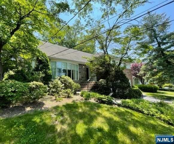 Rare opportunity perfectly located in one of Teaneck's most sought after neighborhoods. Enjoy easy living in this sprawling tri-level split with 4 large BRs including a large primary suite, 3.5 baths, EIK, formal living room and dining room, plus an additional den/rec room. Perfectly perched on almost 8000SF of property including a 75 ft frontage, a great yard and a full 2 car garage this home sits ready for your updates and personal touches. Property is being offered in 'as is' condition only. Do not miss this opportunity to own in one of the best neighborhoods in the area.