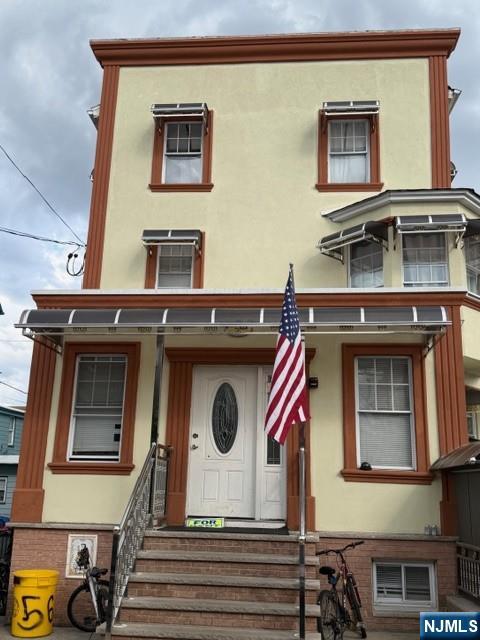 4 FAMILY WITH A 7.6% CAP RATE, THIS PROPERTY WAS REMODELED FROM GUT TO STUD ABOUT 6 YEARS AGO, NEW ELECTRICITY, NEW PLUMBING, NEWER ROOF, NEW SHEETROCK, PROPERTY HAS SEPARATE UTILITIES, TENANTS PAY HEAT & HOT WATER, FIRST FLOOR FEATURES 2 APTS, ONE HAS A TWO BEDROOM UNIT AND THE OTHE APT HAS A 1 UNIT APT. SECOND FLOOR HAS 3 BEDROOMS. 1 FB. 3RD FLOOR HAS 2 BEDROOMS, FULL BATH, DECK WITH PARIAL NYC VIEW, NYC TRANSPORTATION 1 BLOCK AWAY. NEXT TO NORTH HUDSON PARK. EXPENSES= water & sewer $4,800, insurance $6,000. taxes $21,045, total expenses, $31,845. total income $11,500 x 12=$138,000 net income $106,155.00