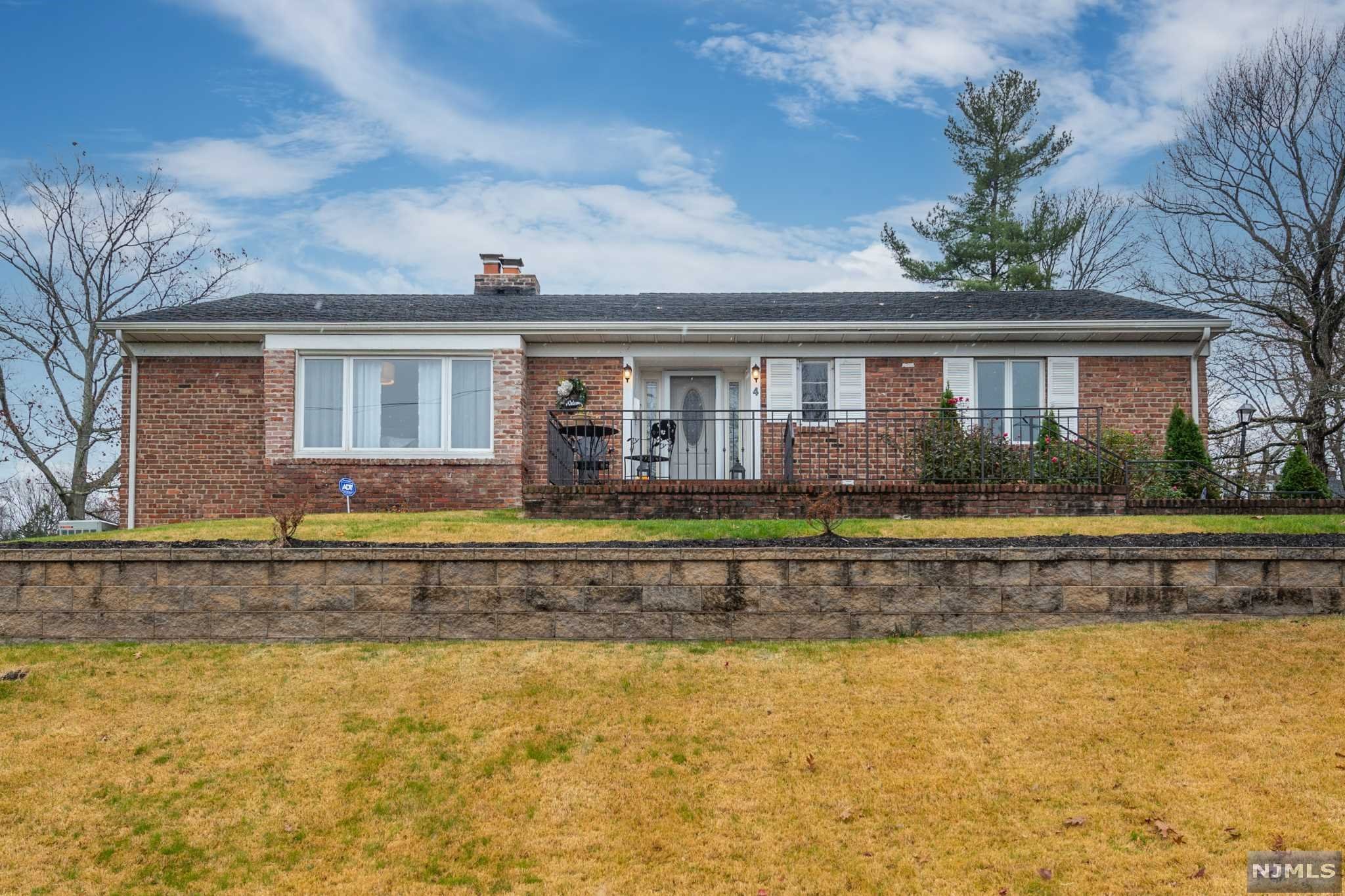 A spacious all brick ranch in the highly sought after St. Cloud section of West Orange. Situated on a corner lot, this 3 bedroom ranch offers large bedrooms all with custom closets. The primary bedrooms has two custom walk in closets, hardwood flooring, and a en suite full bathroom. The living room has beautiful built in shelving that accent the wood burning fireplace. The living room opens to the formal dining space with also has beautiful hardwood floors and is steps from the light and bright eat in kitchen. The kitchen has high end appliances, granite countertops, an island and large windows that overlook the backyard. The lower level has stunning epoxy floors, a rec room, office, and game room that has a pool table! This home is a commuter's dream! The Jitney #3 stops just around the corner, which takes you to the South Orange train station! This home also features central air, attic storage, an a new hot water heater. Nothing to do but move in!