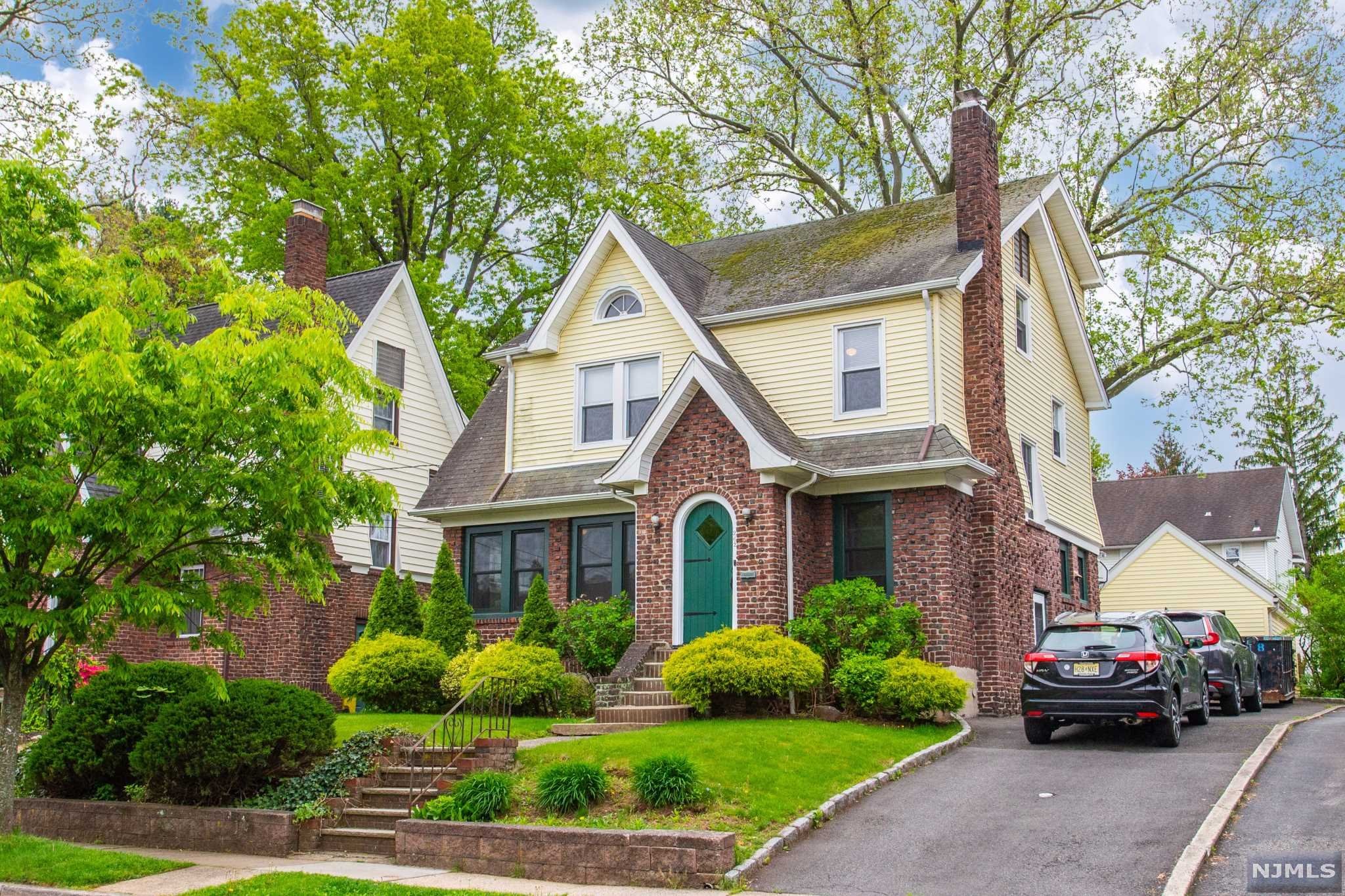 Beautiful home in one of the most desirable neighborhood in Teaneck. Bright and light Colonial with entry foyer to a very large living room , formal dining room with opening to the kitchen and to a small deck. Beautiful hardwood floors and a fireplace. Second floor has large three bedroom and wonderful bath. Third floor has a very large primary bedroom with a very large bathrooms. Basement is full and finish with a powder room.