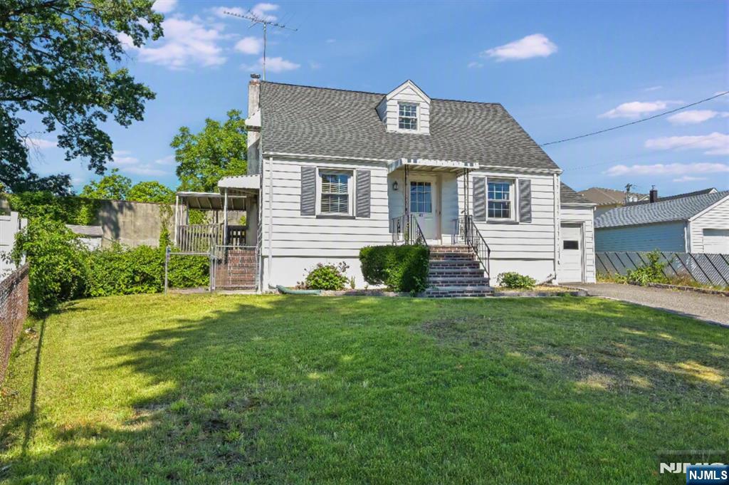 Charming 4-bedroom, 1 full bath home offering endless potential in a desirable Bergen County location. Featuring a one-car garage and a spacious backyard, this property provides the perfect opportunity for investors, renovators, or homeowners looking to customize a home to their own taste and style. The functional floor plan offers a solid foundation for modern updates and future enhancements. Conveniently located near schools, shopping, dining, and major highways. Situated on a quiet residential street, this home combines location, value, and opportunity. Bring your vision and transform this well-built home into something truly special.