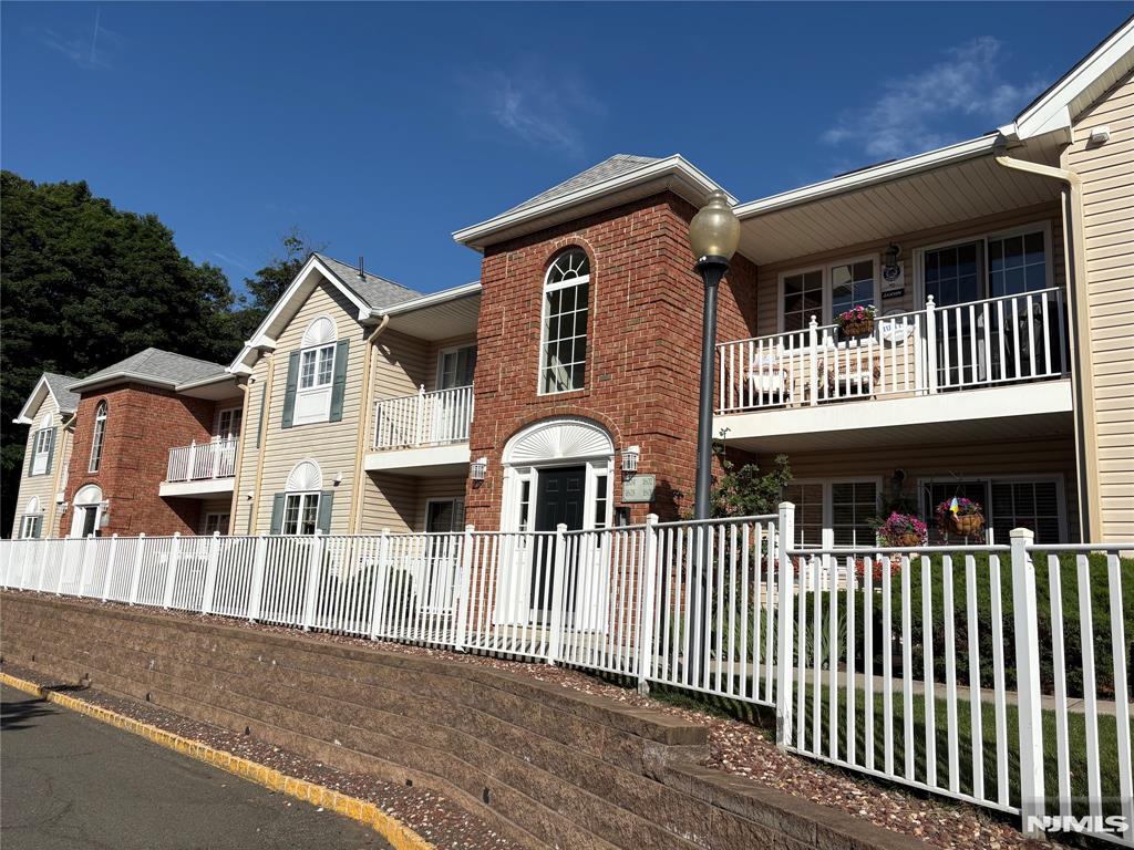 Perfect blend of move-in ready, modern style + ultimate convenience in this unique one-floor Park Glen condo! Experience sophisticated, airy comfort in this gut-renovated 2-BR, 2-bath unit with abundant natural light. Open living layout is warmed by beautiful bamboo flooring and elegant crown molding throughout. Primary ensuite BR is oasis of calm with walk-in glass-door shower & custom walk-in closet, and sliders to terrace overlooking Grover Cleveland Park just 30 feet away. 2nd BR with serene bay window sitting area. Tub-Shower Hall Bath sits across from dedicated Laundry Room designed with ample storage space & full-size LG-washer/dryer. Redesigned custom-kitchen with breakfast bar and cabinetry to match the granite countertops & cleverly disguise the dishwasher while complementing the stainless steel Kitchenaid appliances: 4-burner gas stove, microwave, and bottom freezer/French-door top fridge. Entertain in the large dining room with a view to the front balcony and sit & have coffee or grill! Private attached garage to stay warm, dry and safe year-round and second parking spot in front Sole-use of 13'x13' private storage room across from garage perfect for housing bikes, seasonal decor, or outdoor gear. Location, location, location perfectly located just 0.2 miles from the heart of Caldwell's vibrant dining and shopping districts, NJ Transit NYC Buses + major highways! Ideal as primary residence or investment with rentals of 1+ year allowed.